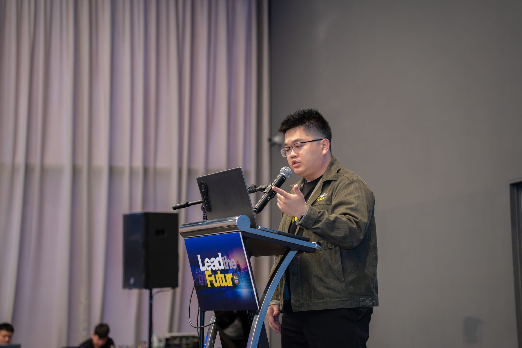 Edmund Hee speaking at a LEAD event