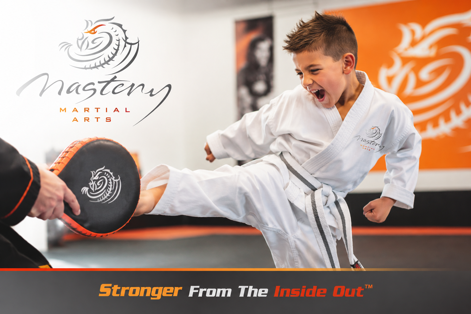 A child receiving patient encouragement from a Mastery Martial Arts instructor after becoming frustrated while learning a new skill. A child receiving patient encouragement from a Mastery Martial Arts instructor after becoming frustrated while learning a new skill.