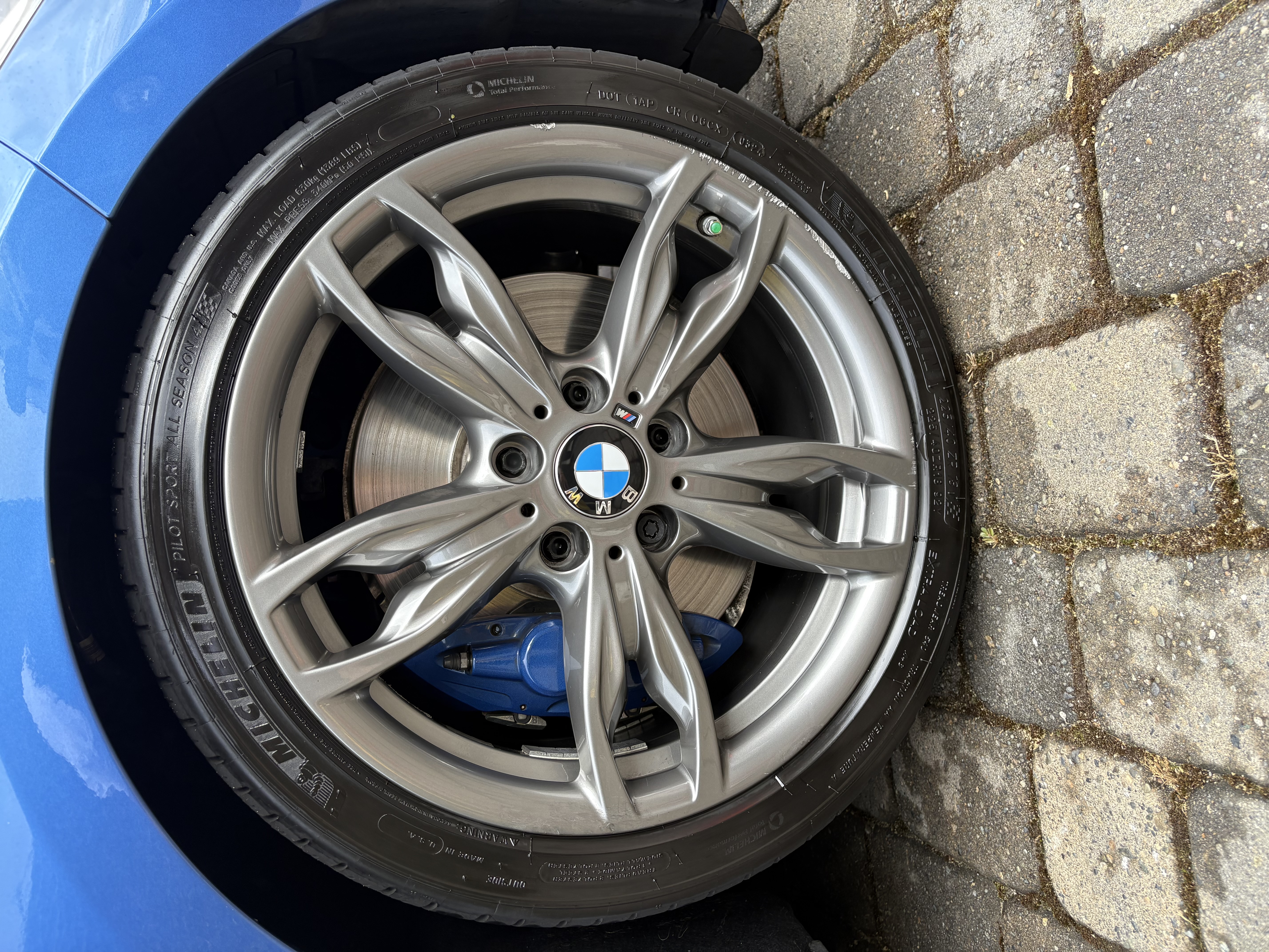 BMW wheel detail close-up after detailing