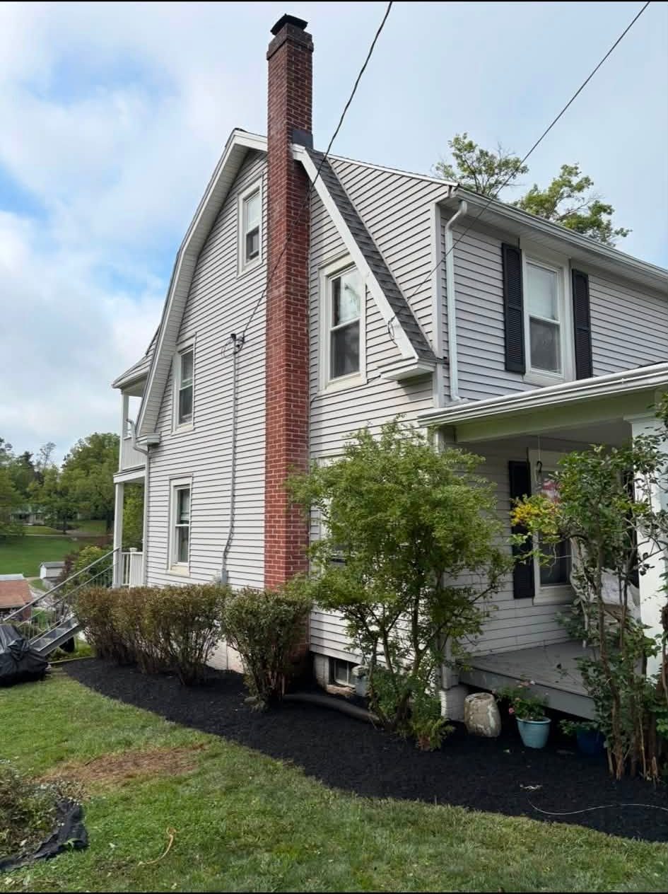 After: Mulch beds & a clean lawn edge