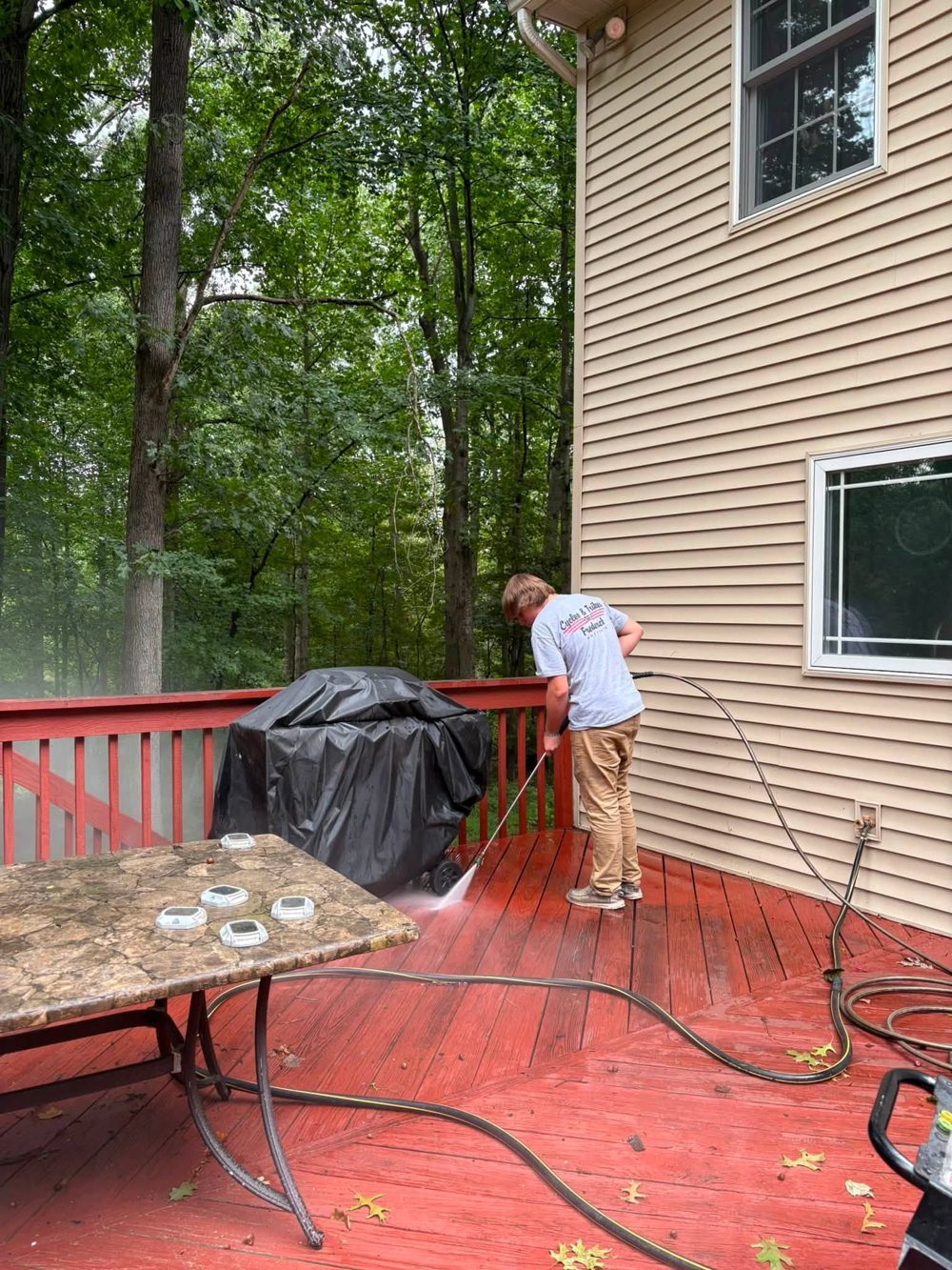 Pressure washing a deck