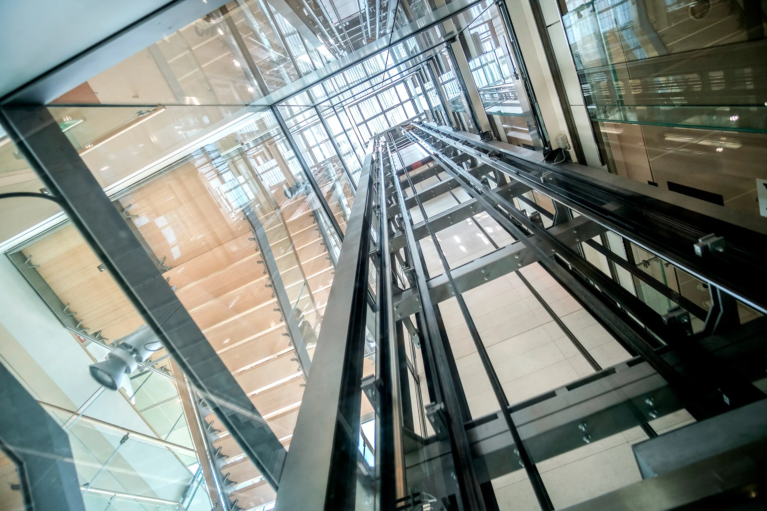 A lift shaft surrounded by windows