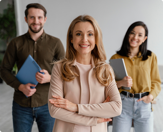 Leader and subordinates smiling