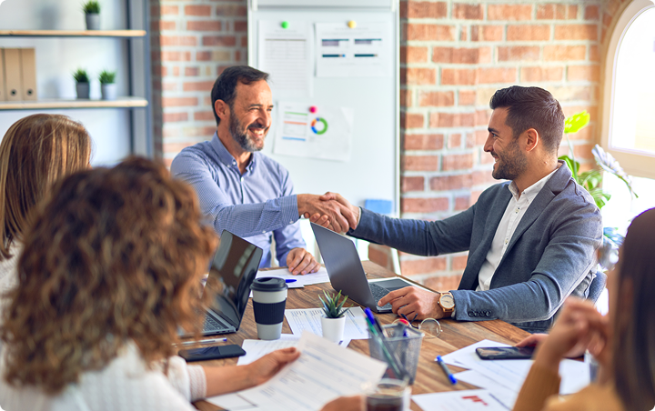 Team members thumb up