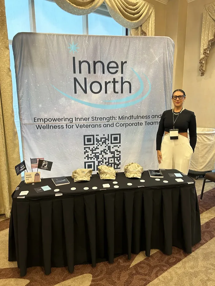 Suhey at the Inner North booth at the 2025 NVBDC National Conference