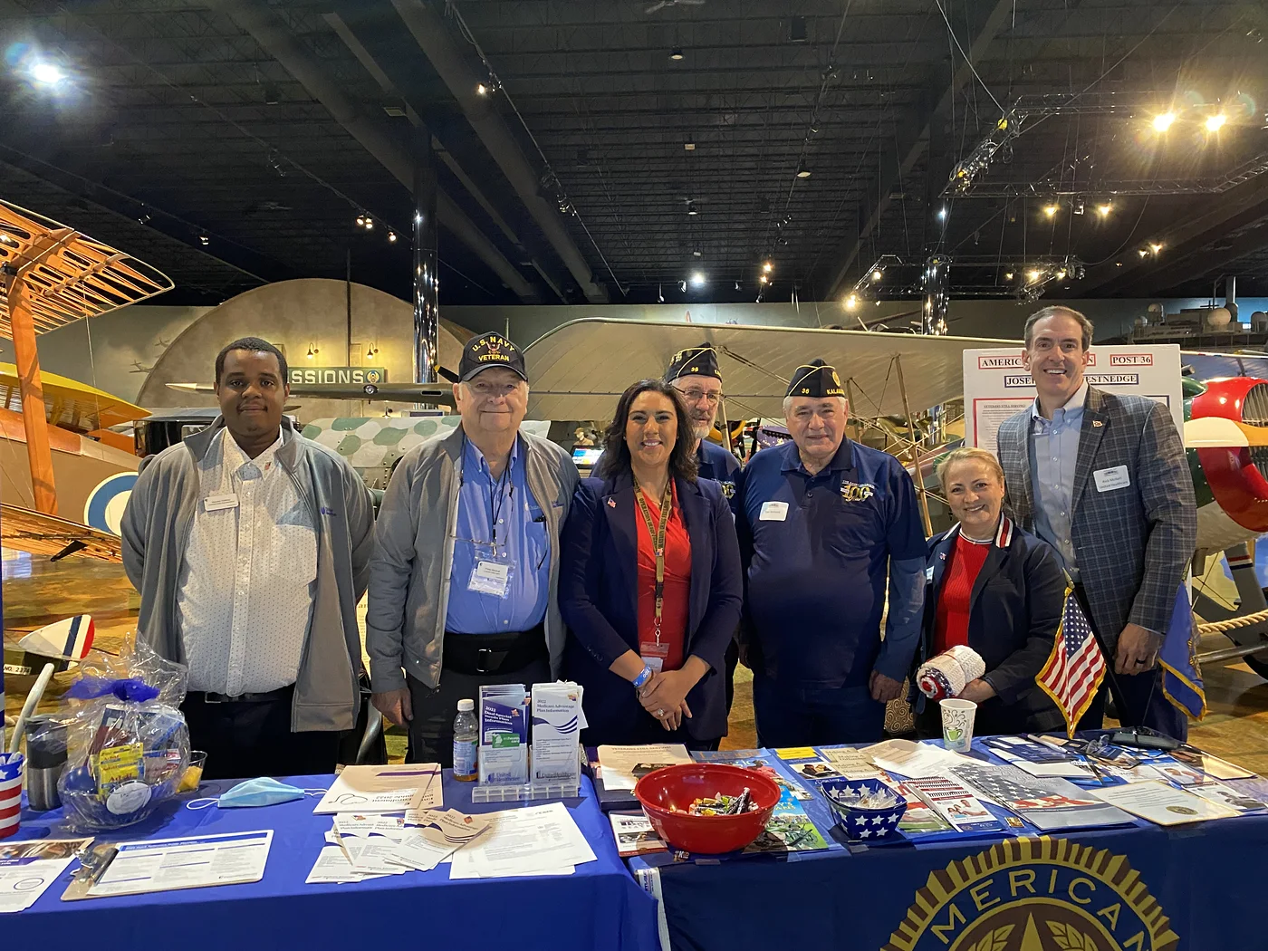 Suhey Fisher with veteran leaders and local officials at a community event in Michigan