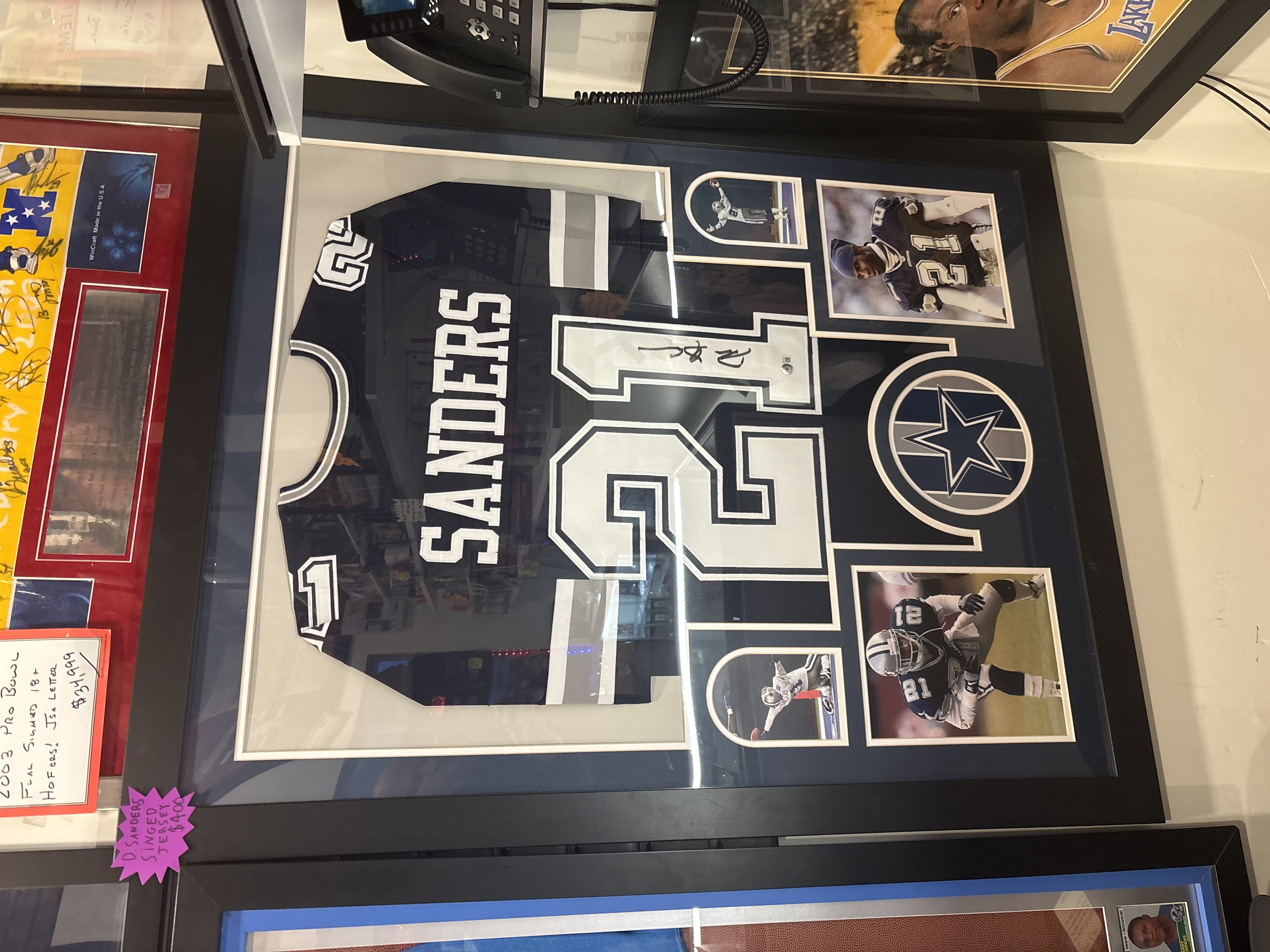 framed Deion Sanders signed jersey framed Deion Sanders signed jersey