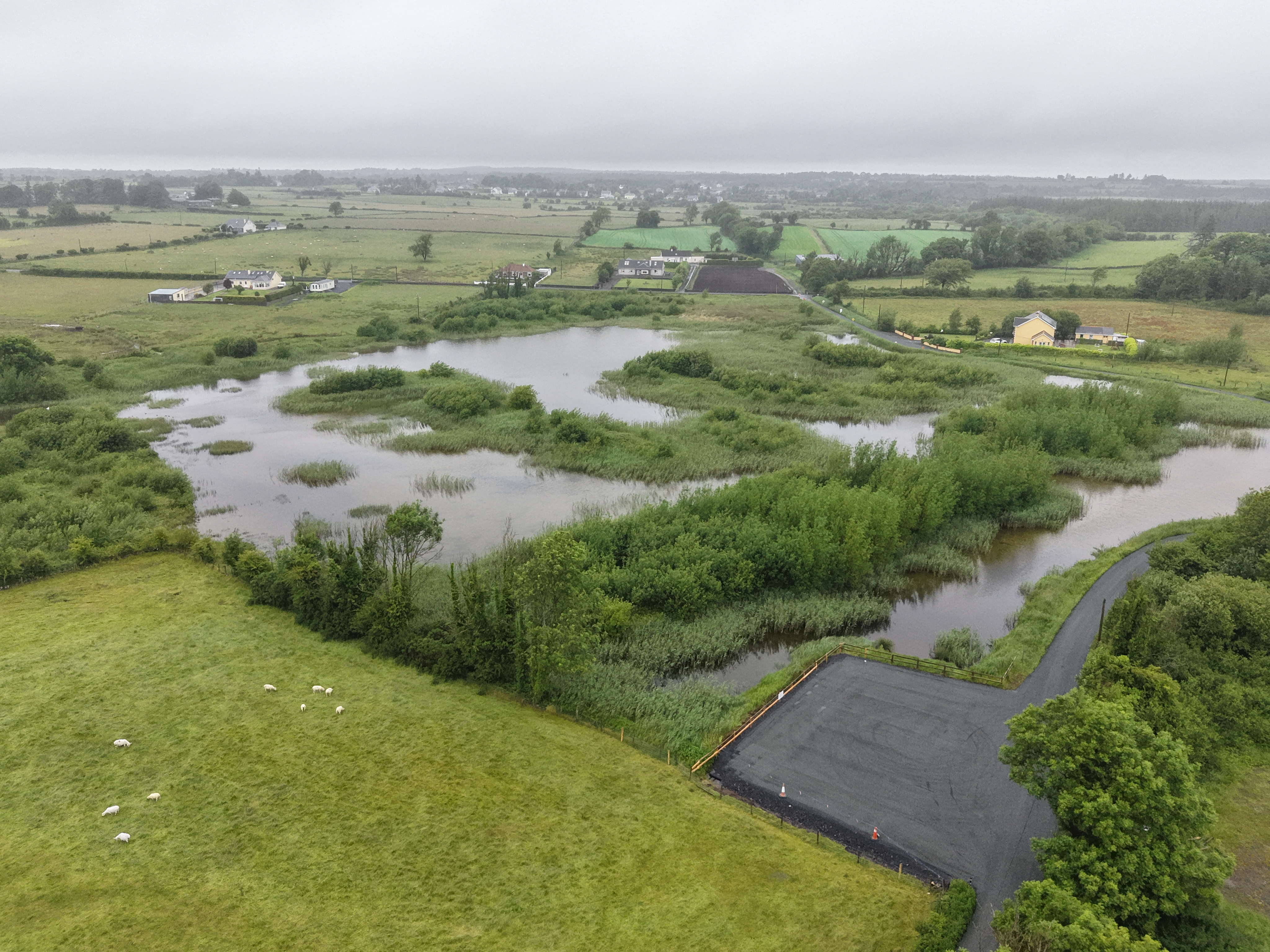 Aerial view of Cahertubber Lake with the newly resurfaced carpark, June 2026