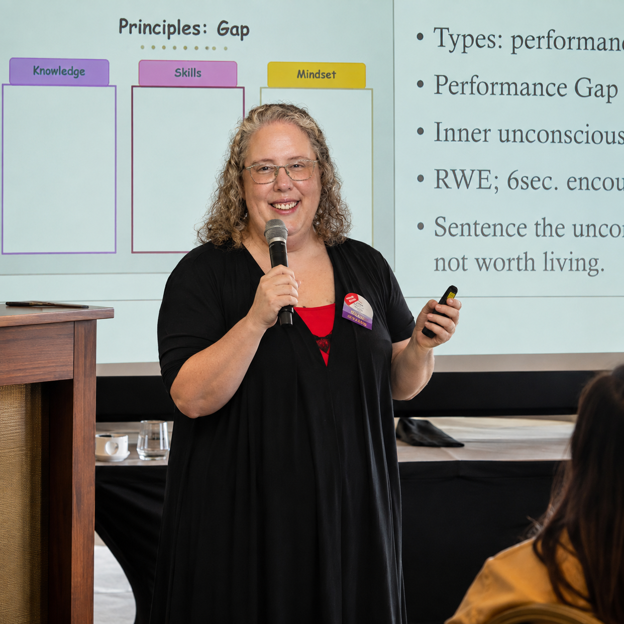 Professional receiving a credential certificate at a podium
