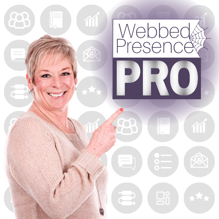 A mature woman smiles as she points to the square WPPro logo.