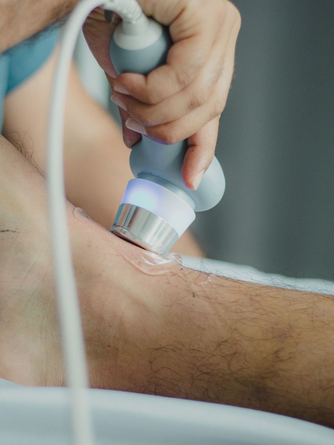 Focused shockwave therapy session at Elevate Therapy Doral