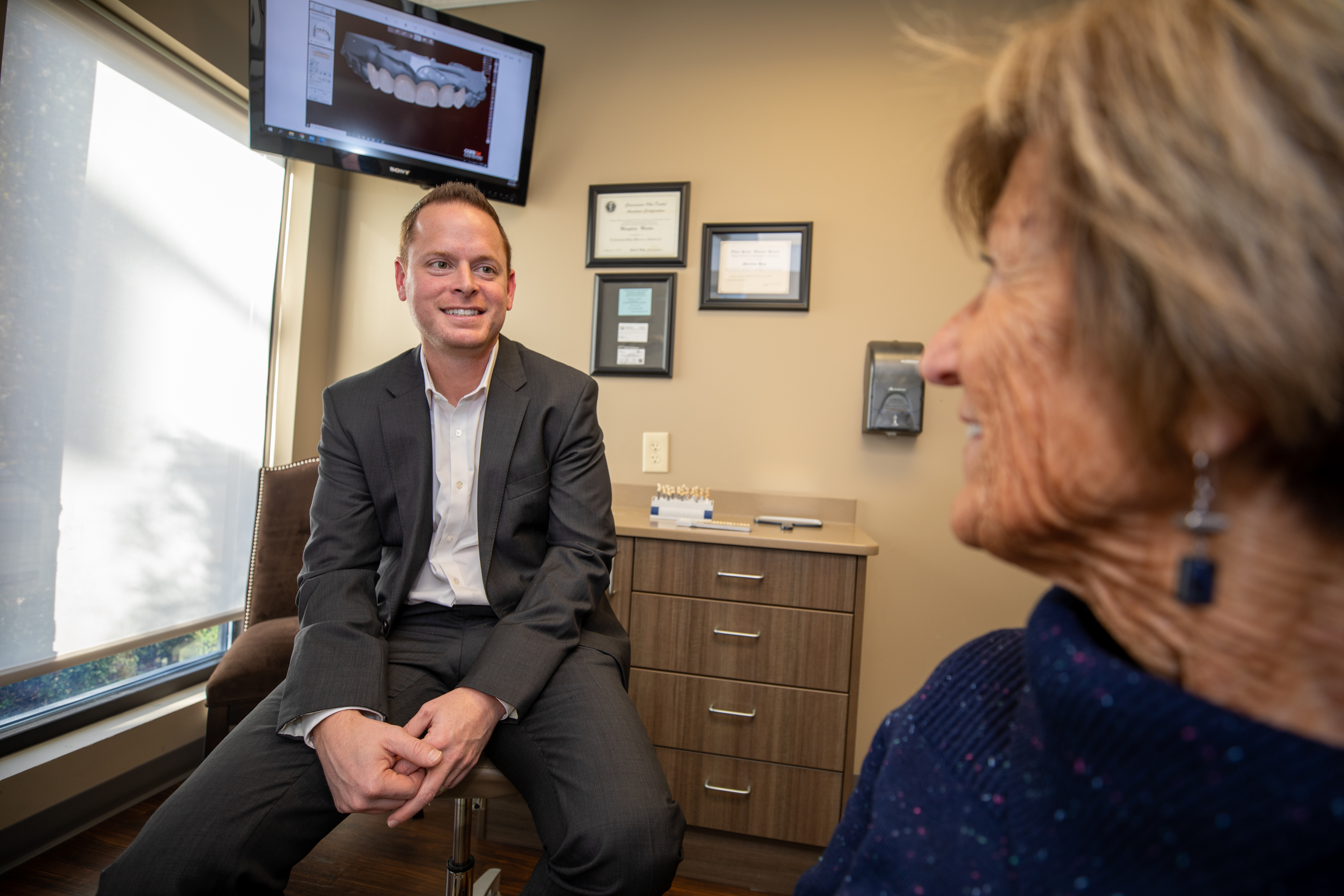 Dr. Blank consulting with patient