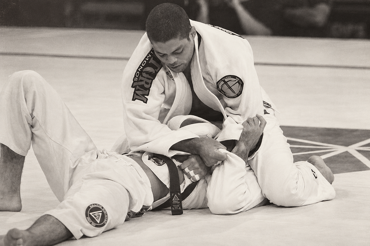 Ryron Gracie defending from bottom against Andre Galvao in Brazilian Jiu-Jitsu Ryron Gracie defending from bottom against Andre Galvao in Brazilian Jiu-Jitsu