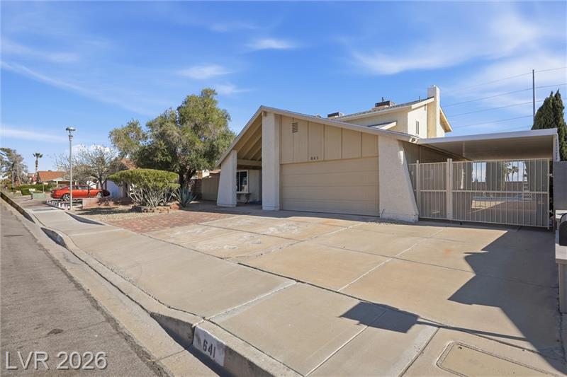 Modern Boulder City NV home with pool, mountain views, and spacious backyard