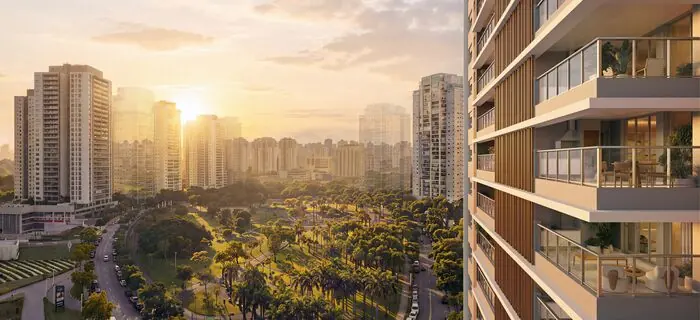 Vista da cidade ao pôr do sol a partir de uma sacada do edifício