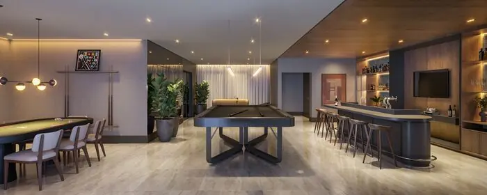 Sala de jogos com mesa de bilhar, bar e área de estar