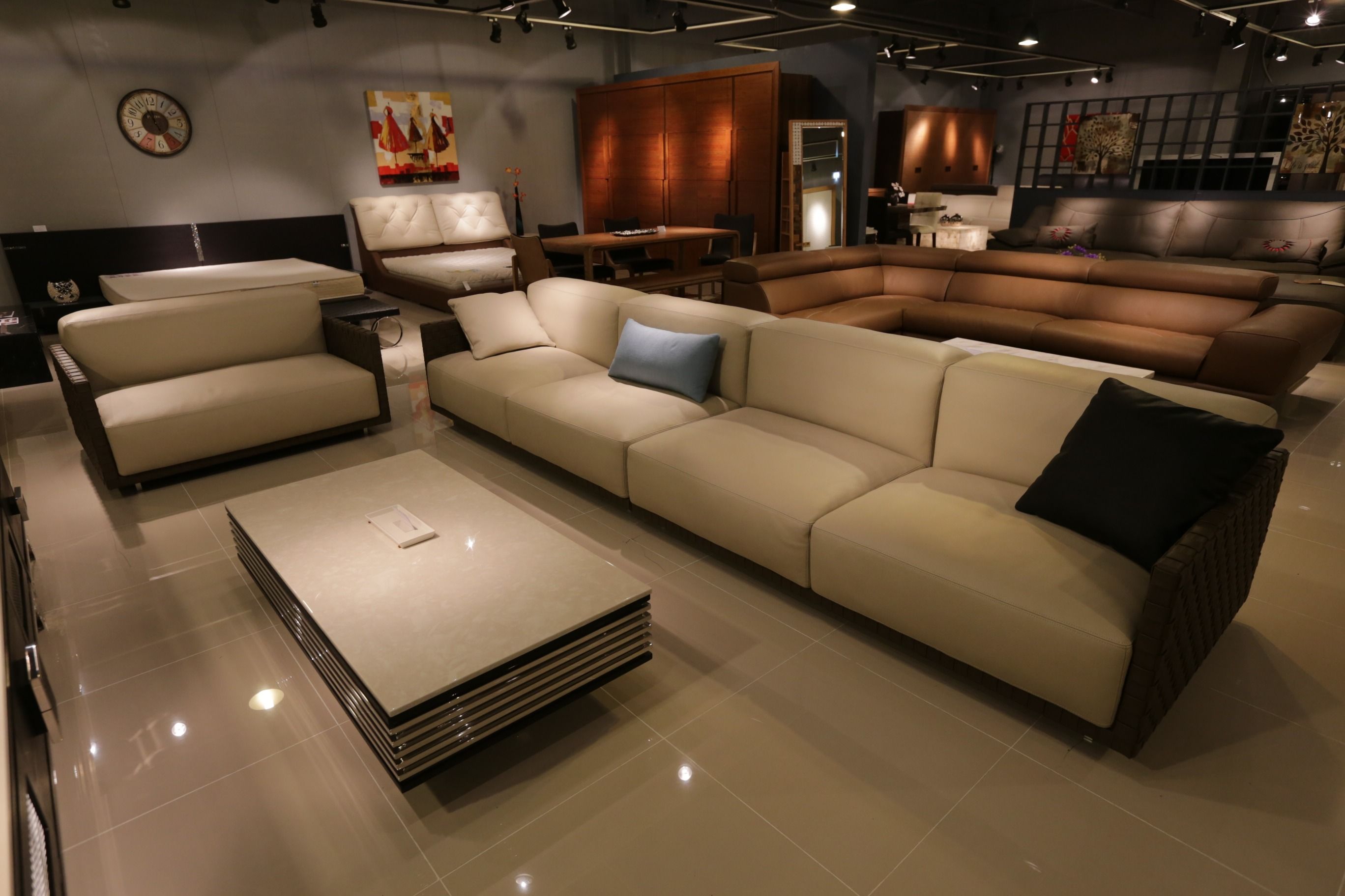 Modern furniture showroom floor with seating and decor on display
