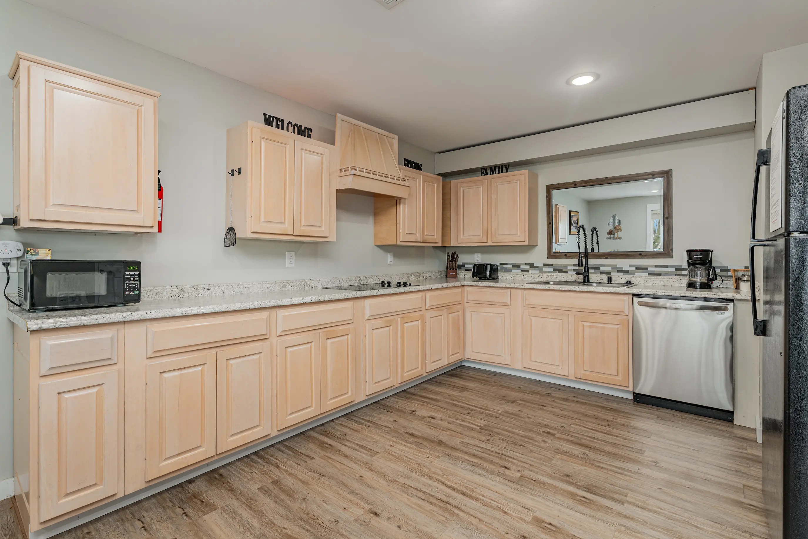Fully equipped kitchen with modern appliances at Cozy Home II