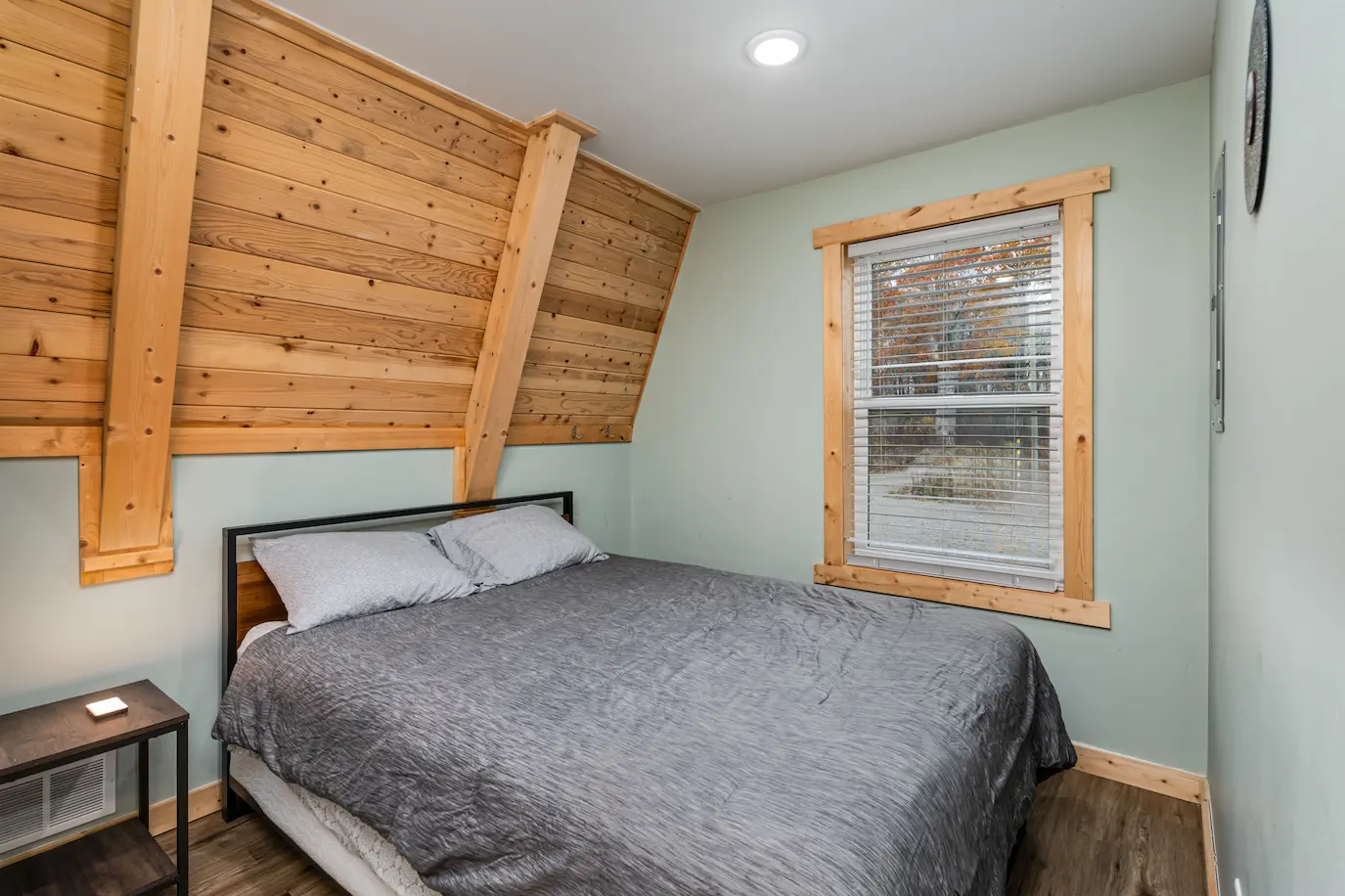 Comfortable second bedroom with natural woodland light