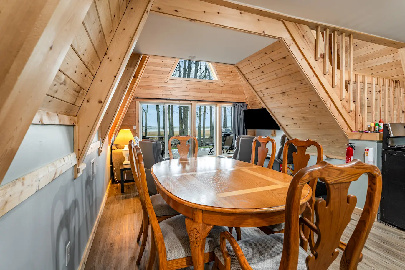 Open concept dining and living area with expansive outdoor views