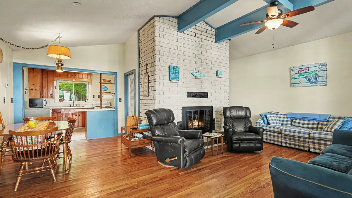 Open living room and dining area at Granny's Cabin