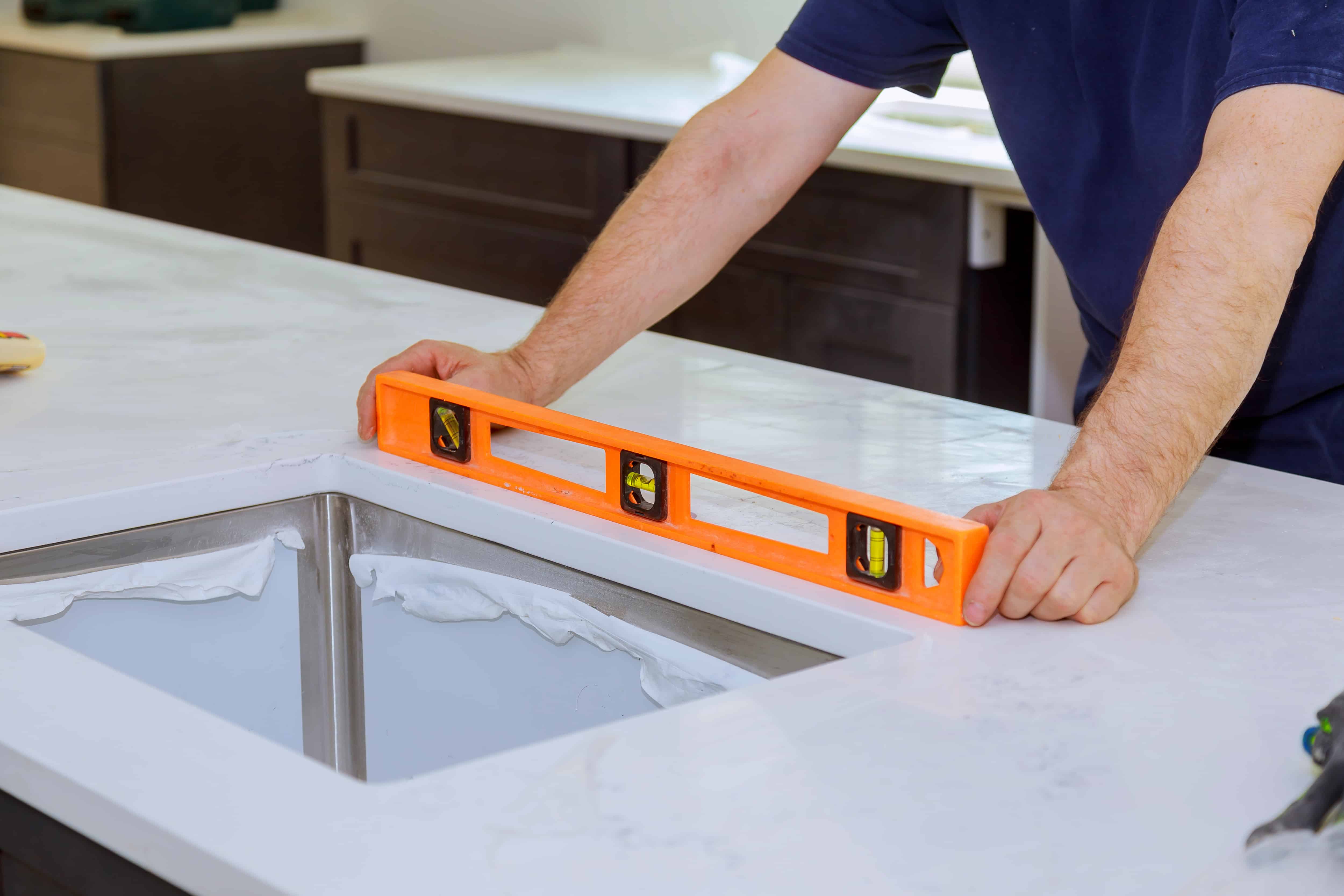 cabinet expert measuring the countertop