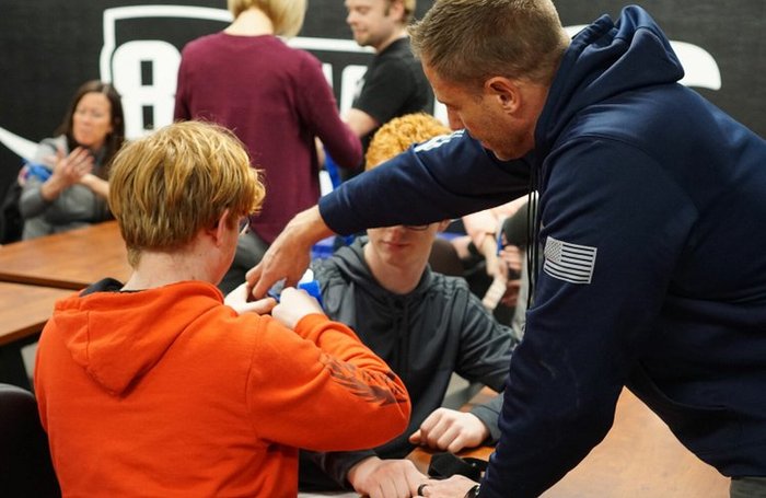 Trevor Thrasher teaching trauma response to kids