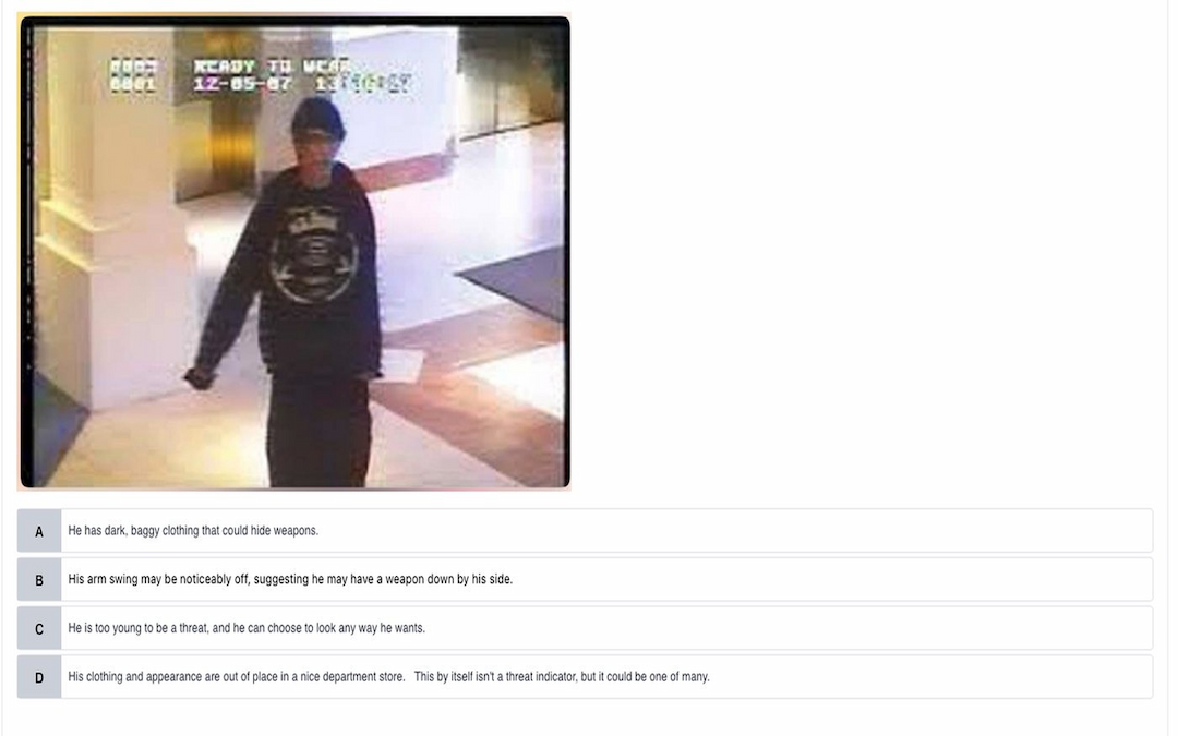 An exam question asking you to name the threat indicators in a real surveillance photo