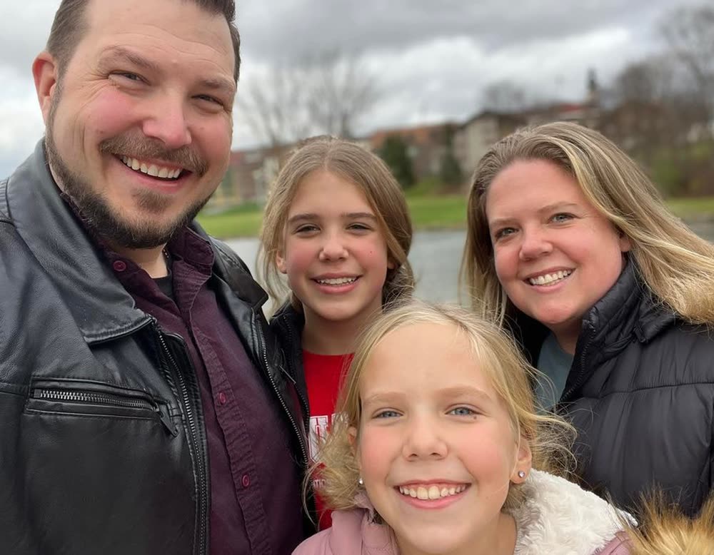 DJ Neumann, host of the Macomb County FRAP Chapter, with his family