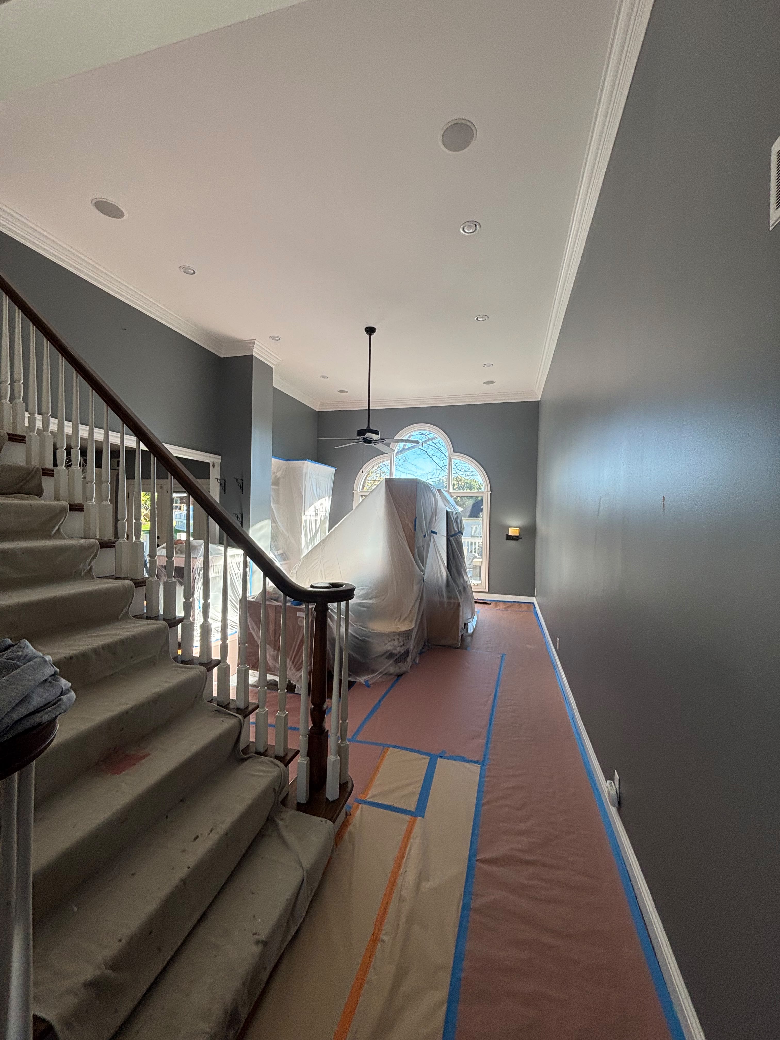 Completed foyer and staircase painting in a Louisville KY home by ECH Professional Painting