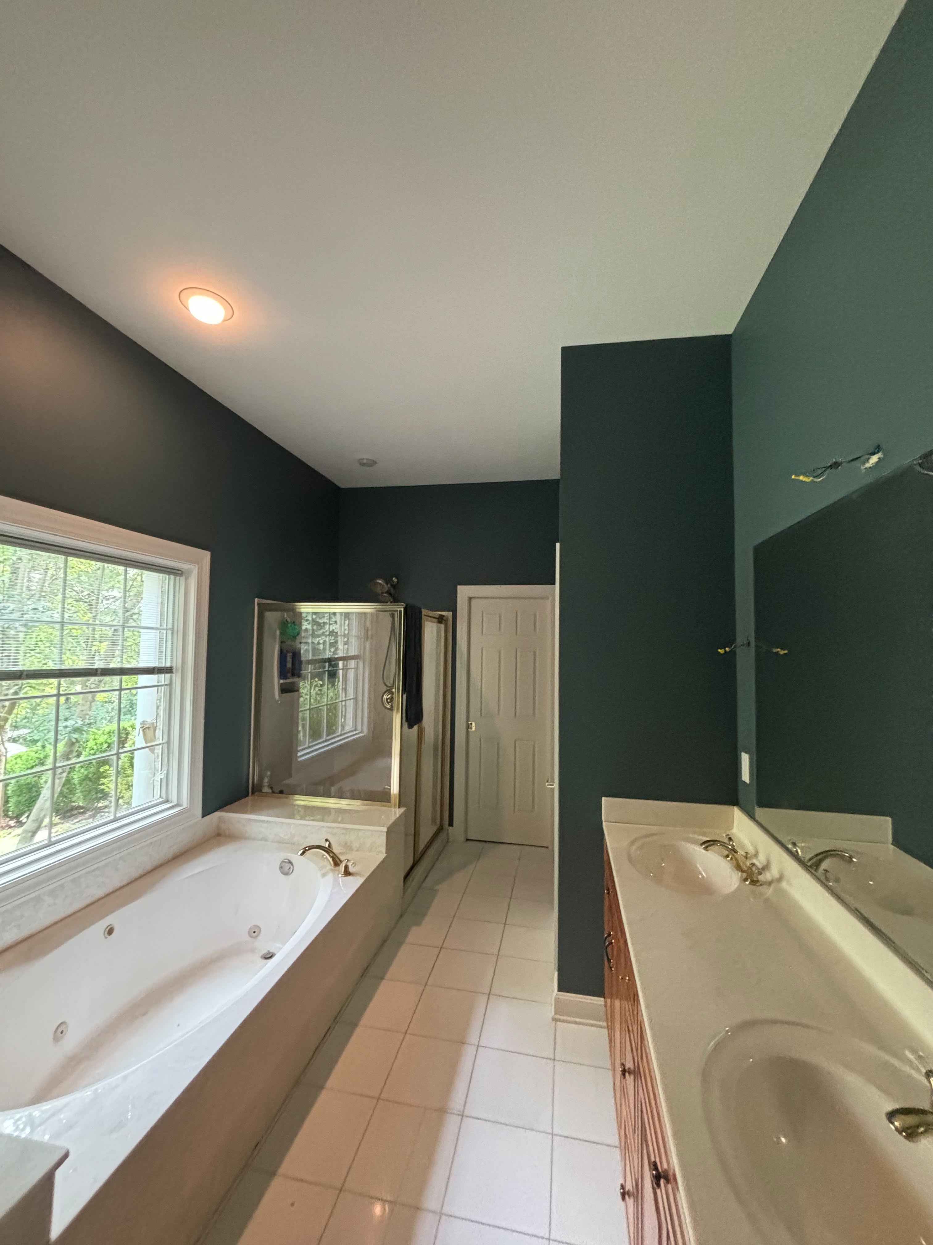 Finished painted bathroom walls and trim in a Louisville KY home by ECH Professional Painting