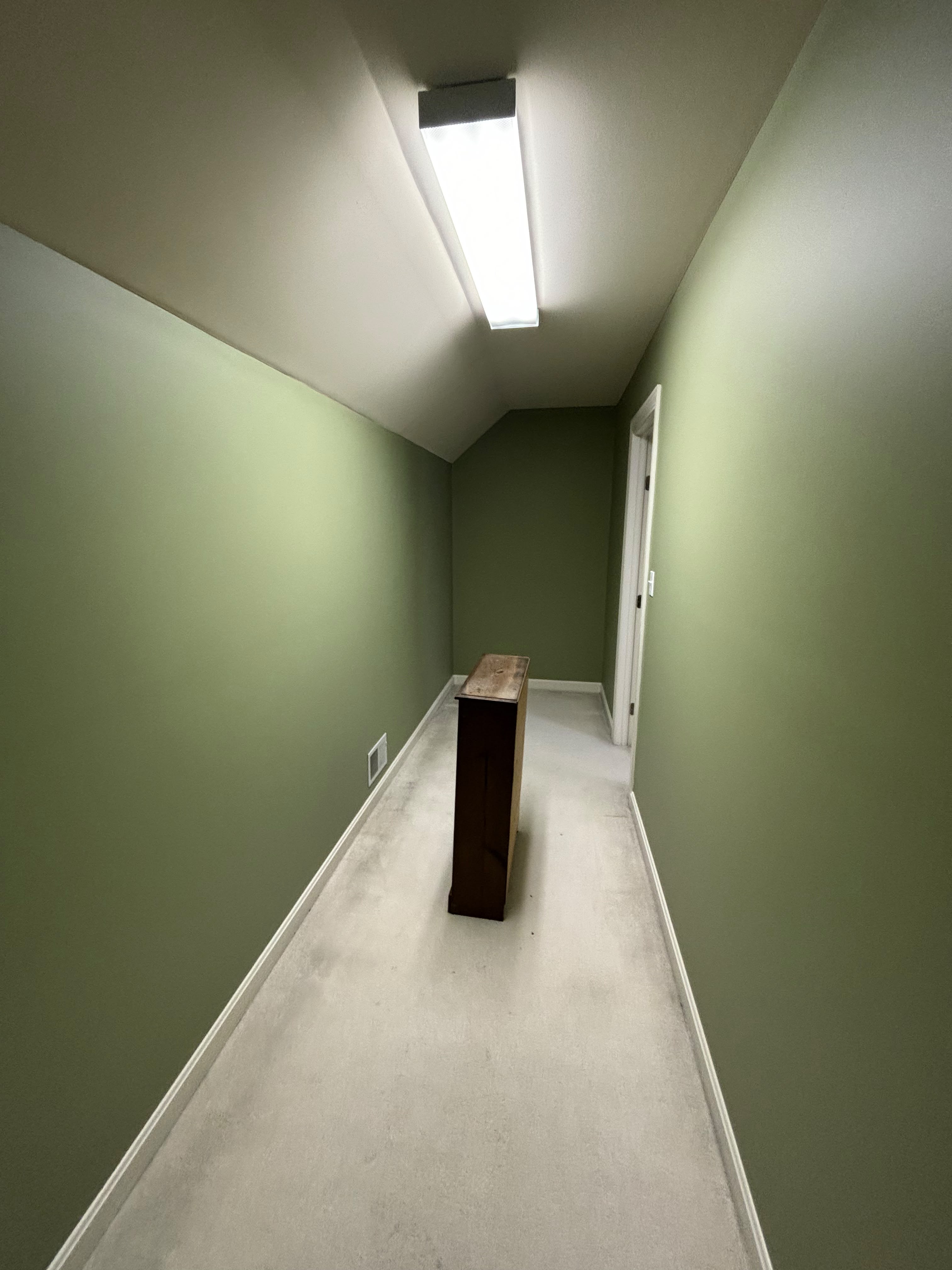 Completed bedroom repaint with crisp ceiling and trim lines in Louisville KY by ECH Professional Painting