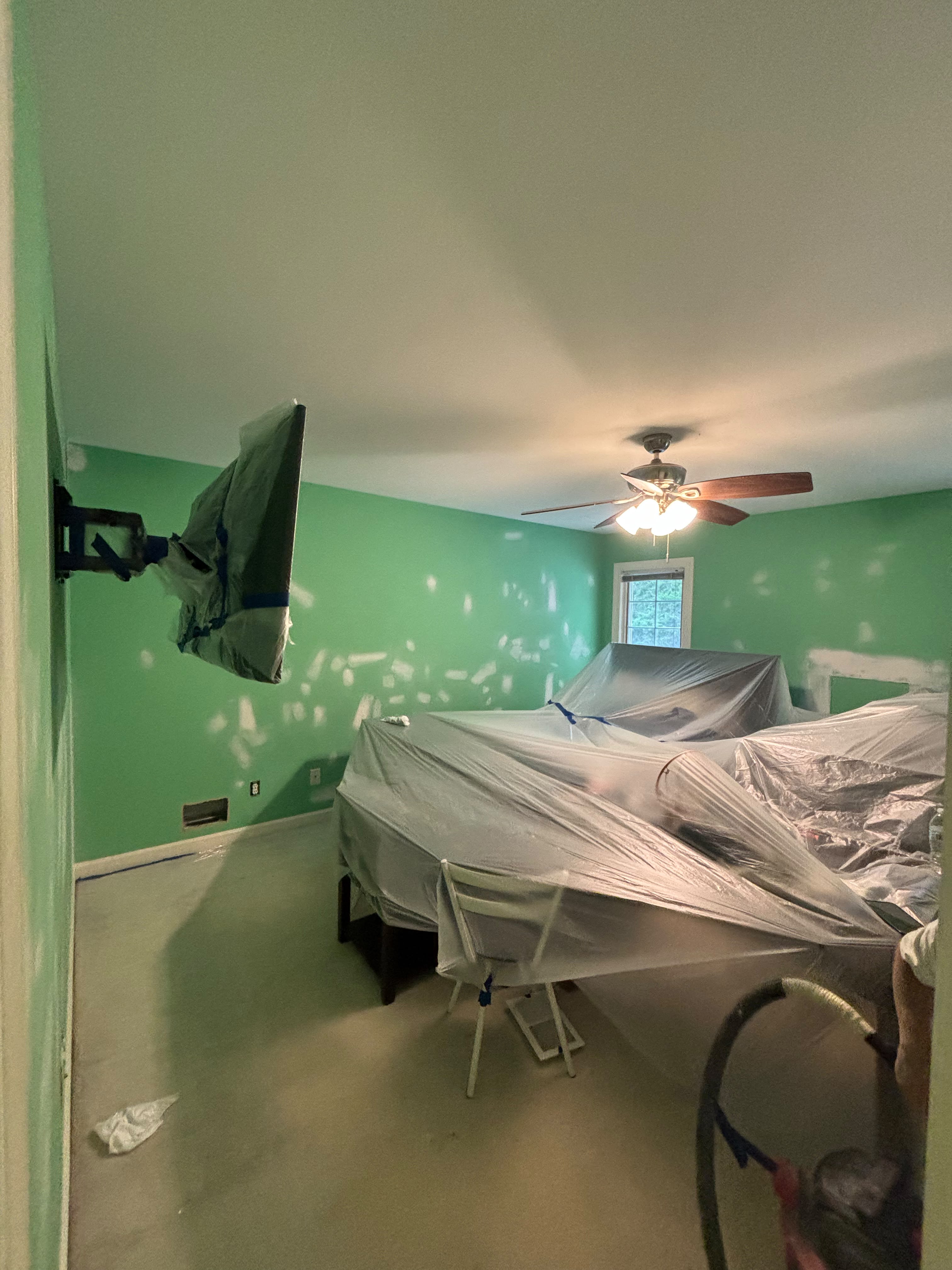 Room masked off during drywall patching in a Louisville KY home by ECH Professional Painting