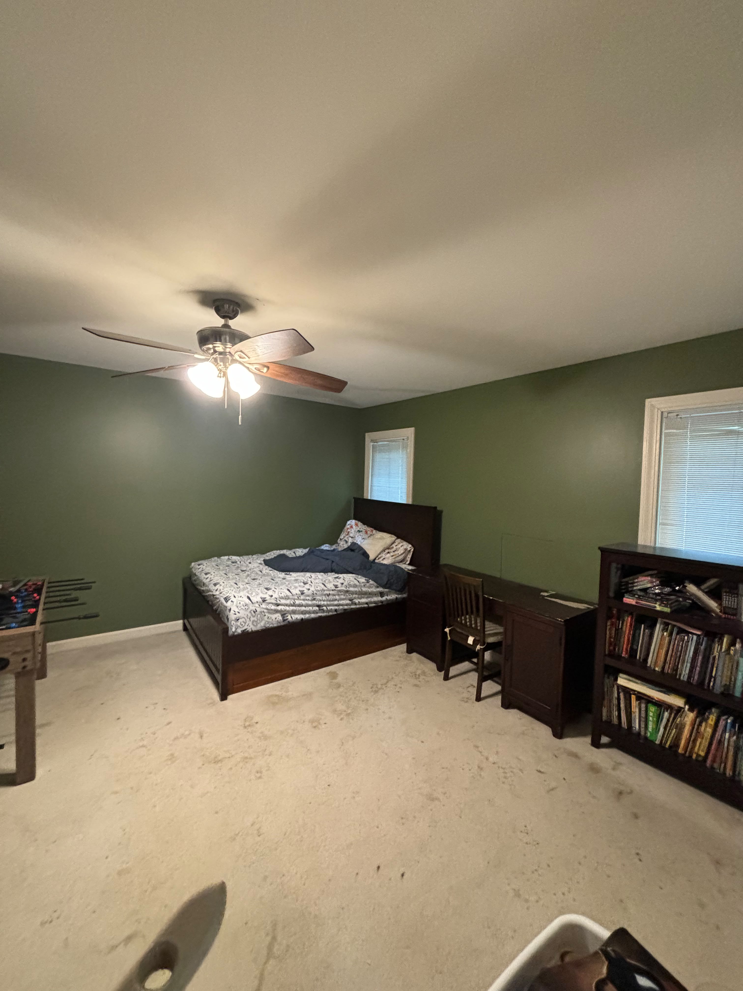 Finished bedroom painting with clean baseboards and trim in Louisville KY by ECH Professional Painting