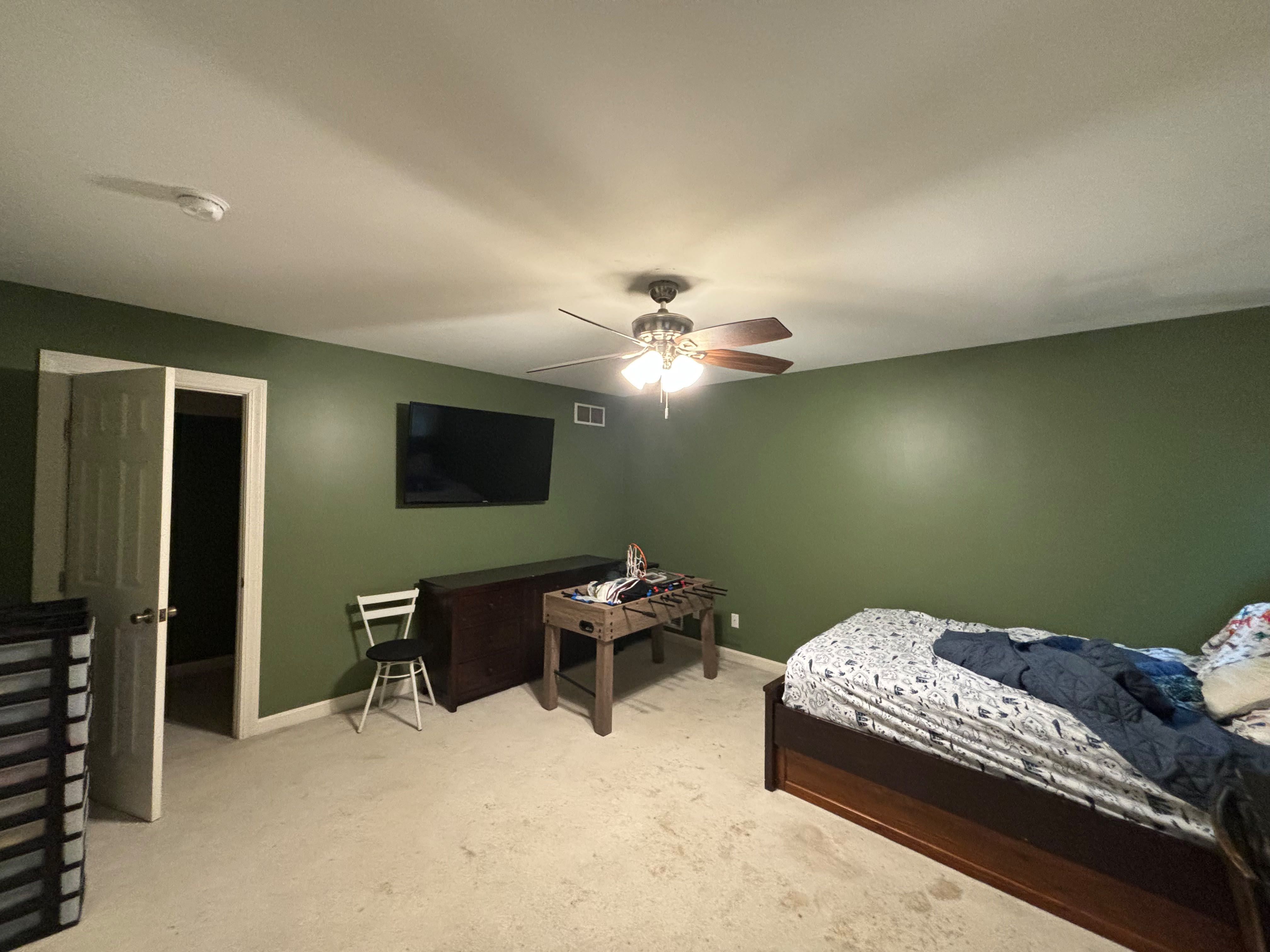 Completed bedroom interior repaint with smooth walls in Louisville KY by ECH Professional Painting