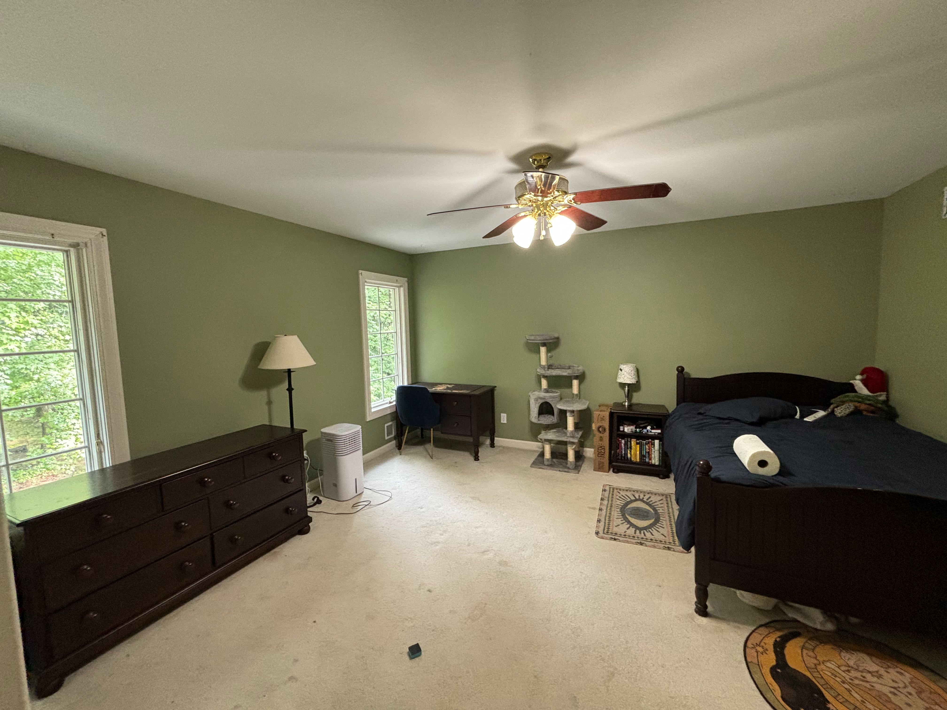 Freshly painted bedroom walls with sharp cut-in lines in a Louisville KY home by ECH Professional Painting