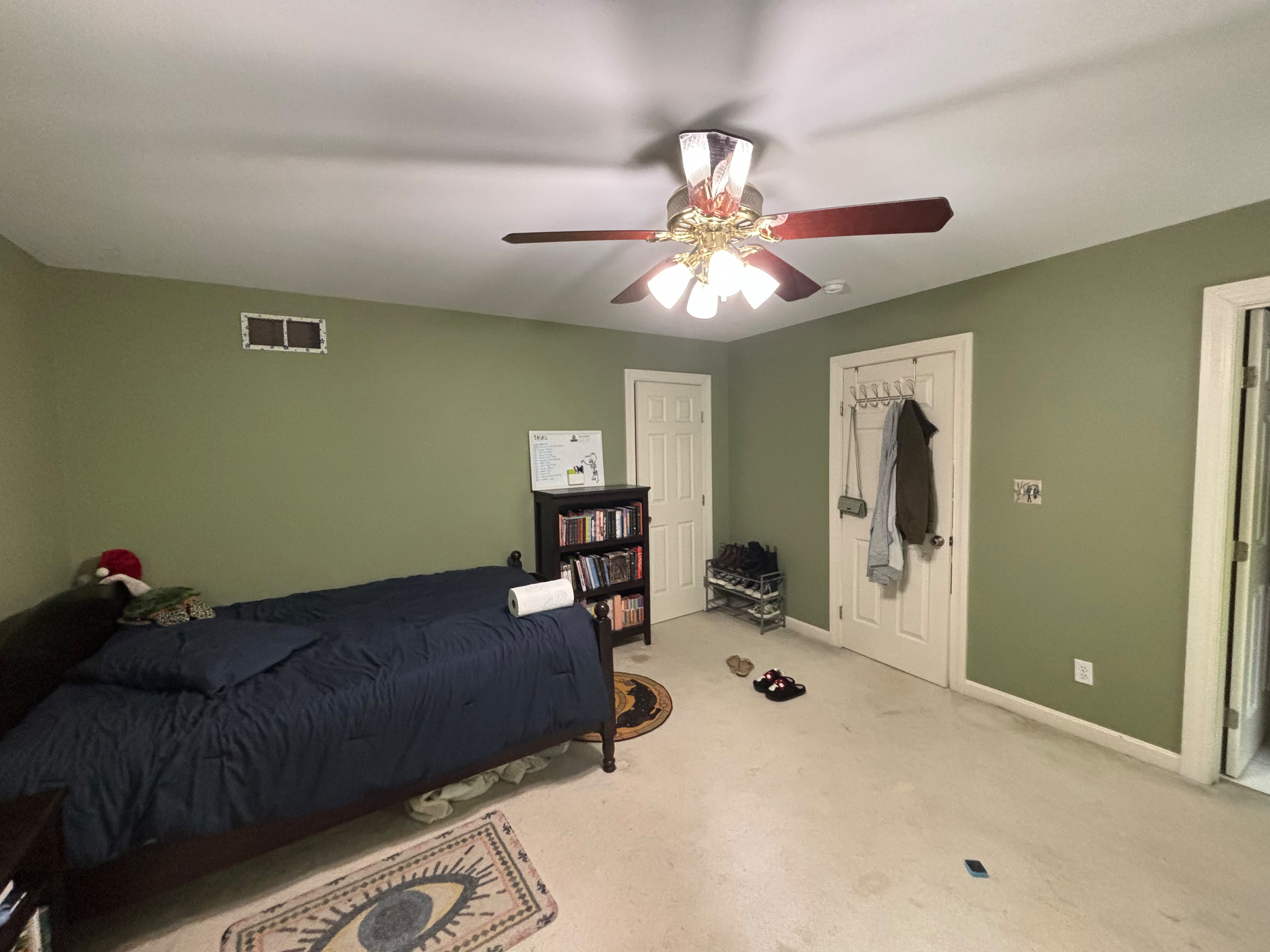 Finished painted bedroom with smooth walls and crisp trim after ECH Professional Painting