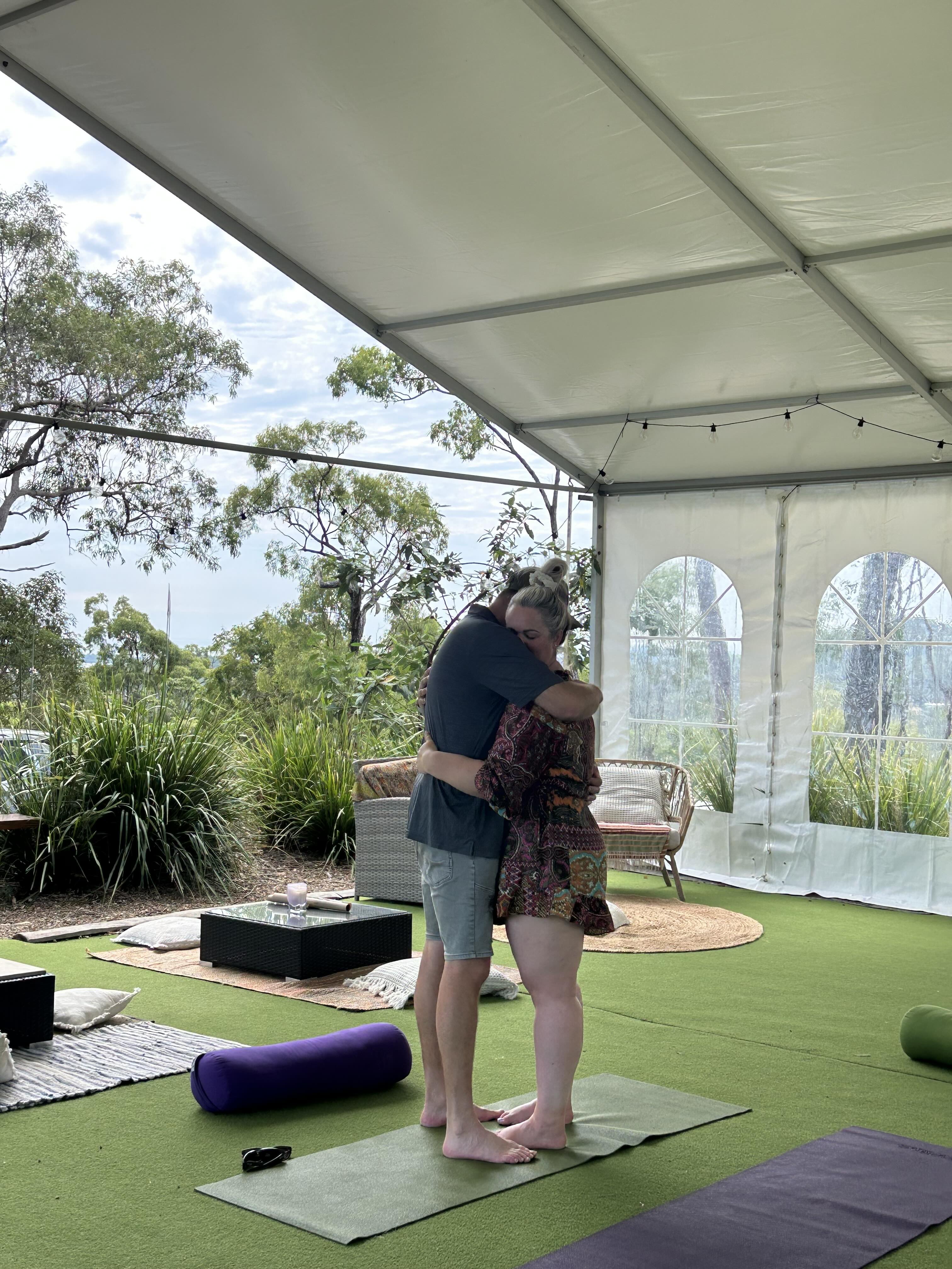 A couple embracing at a retreat