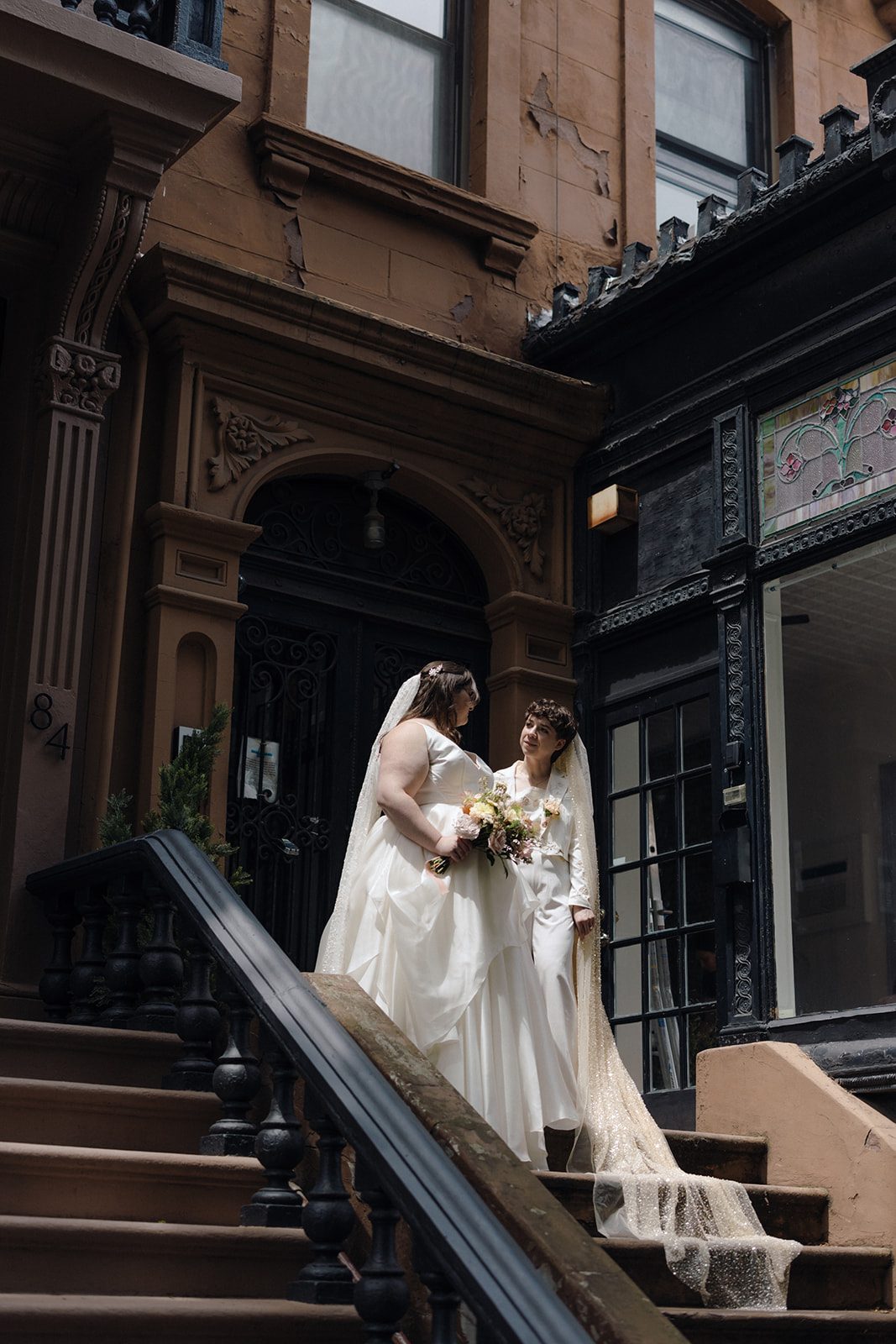 Ceremony moment surrounded by warm florals and candlelight