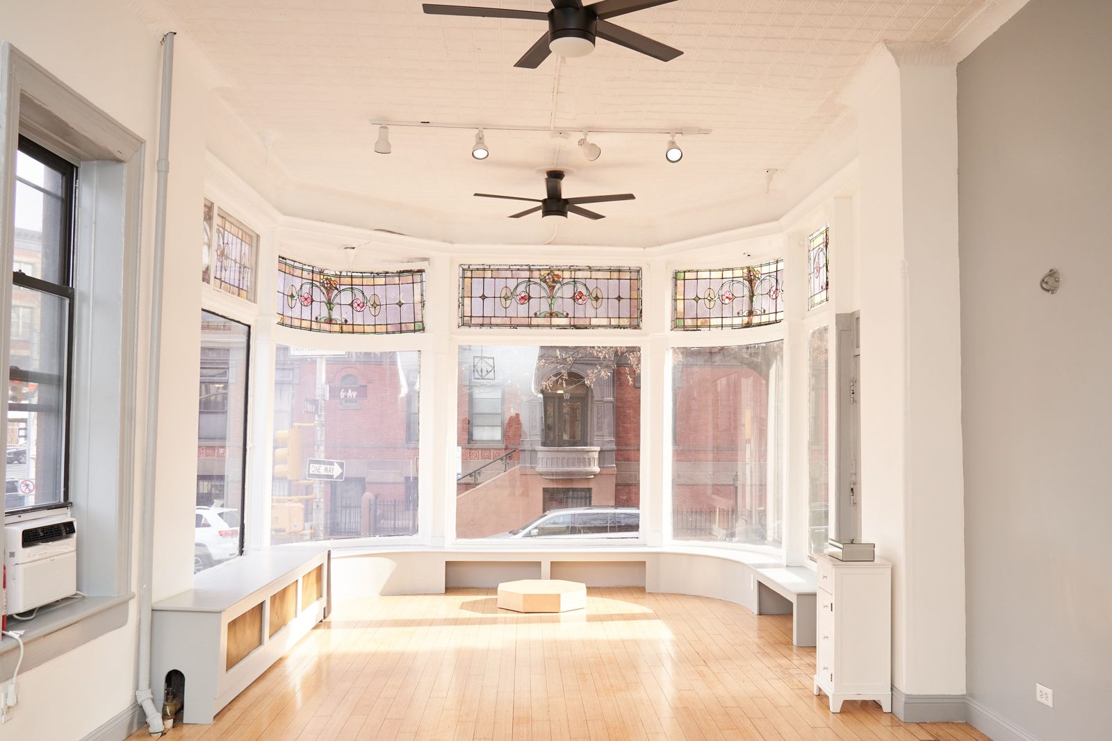 Atrium82 brownstone and bay window on 6th Ave