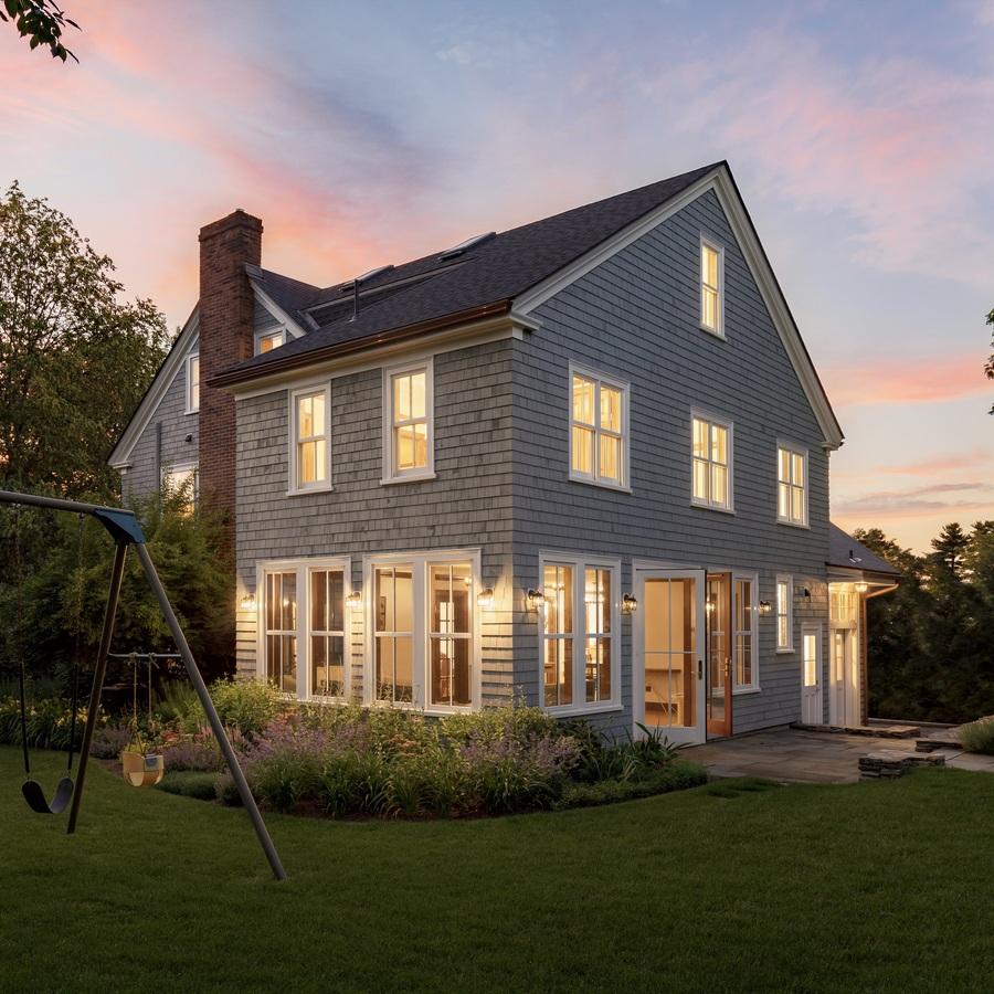 Two-story residential home addition with matching exterior siding Two-story residential home addition with matching exterior siding