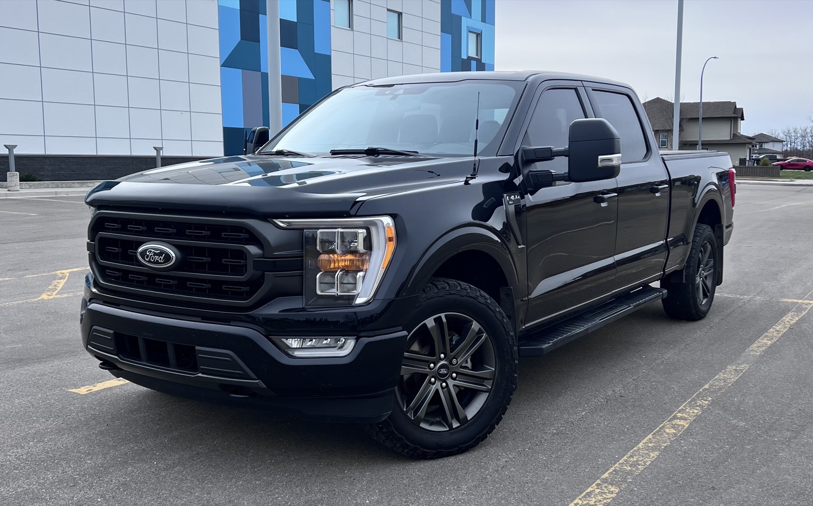 A black Ford F-150 photographed for a private sale listing