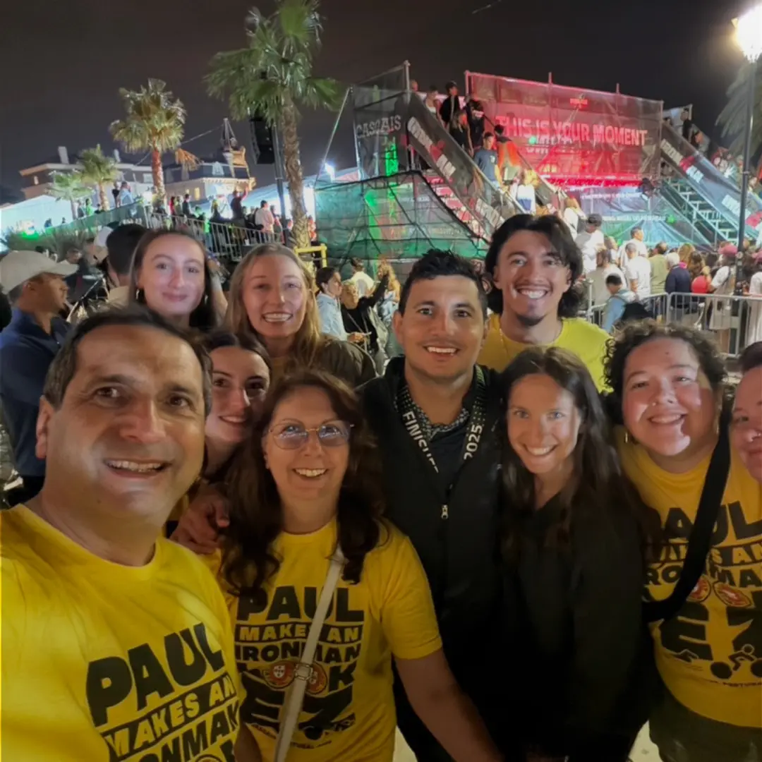 paul el zoghbi surrounded by his family during his Portugal ironman