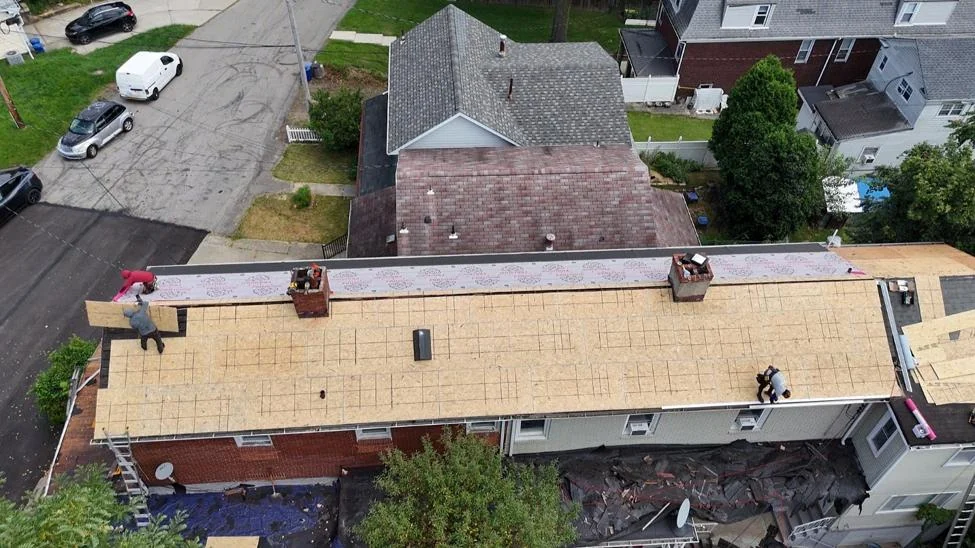 All rotted wood replaced with new sheathing before anything goes on top.