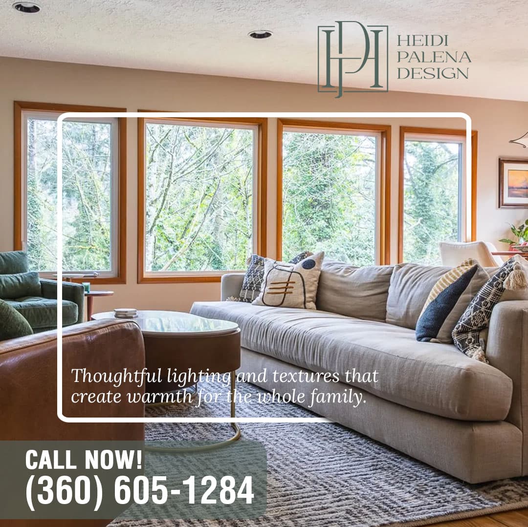 Warm modern living room with sectional sofa, textured decor, and large wood-framed windows