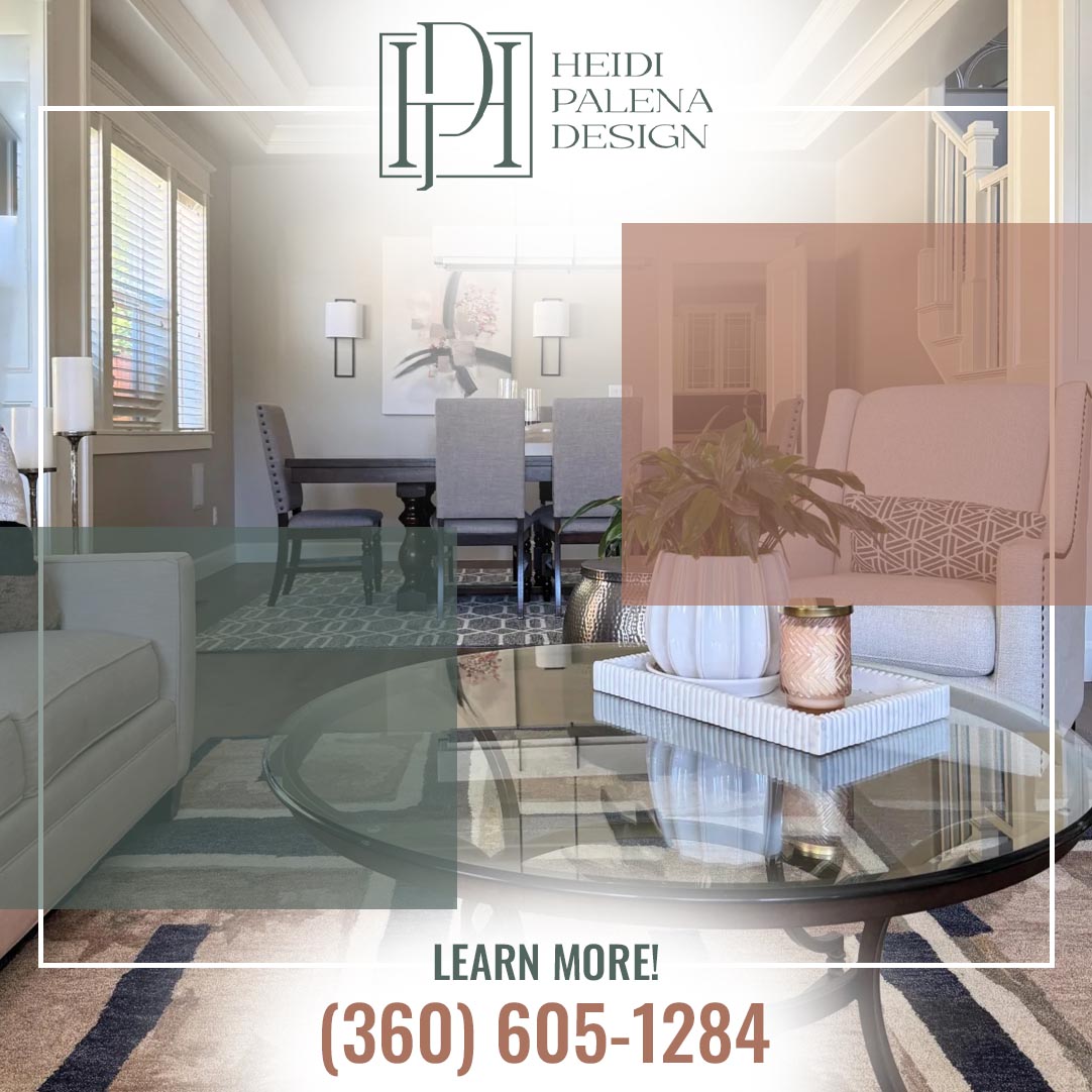 Overlapping transitional living room and dining room with gray upholstery, glass coffee table, and floral artwork