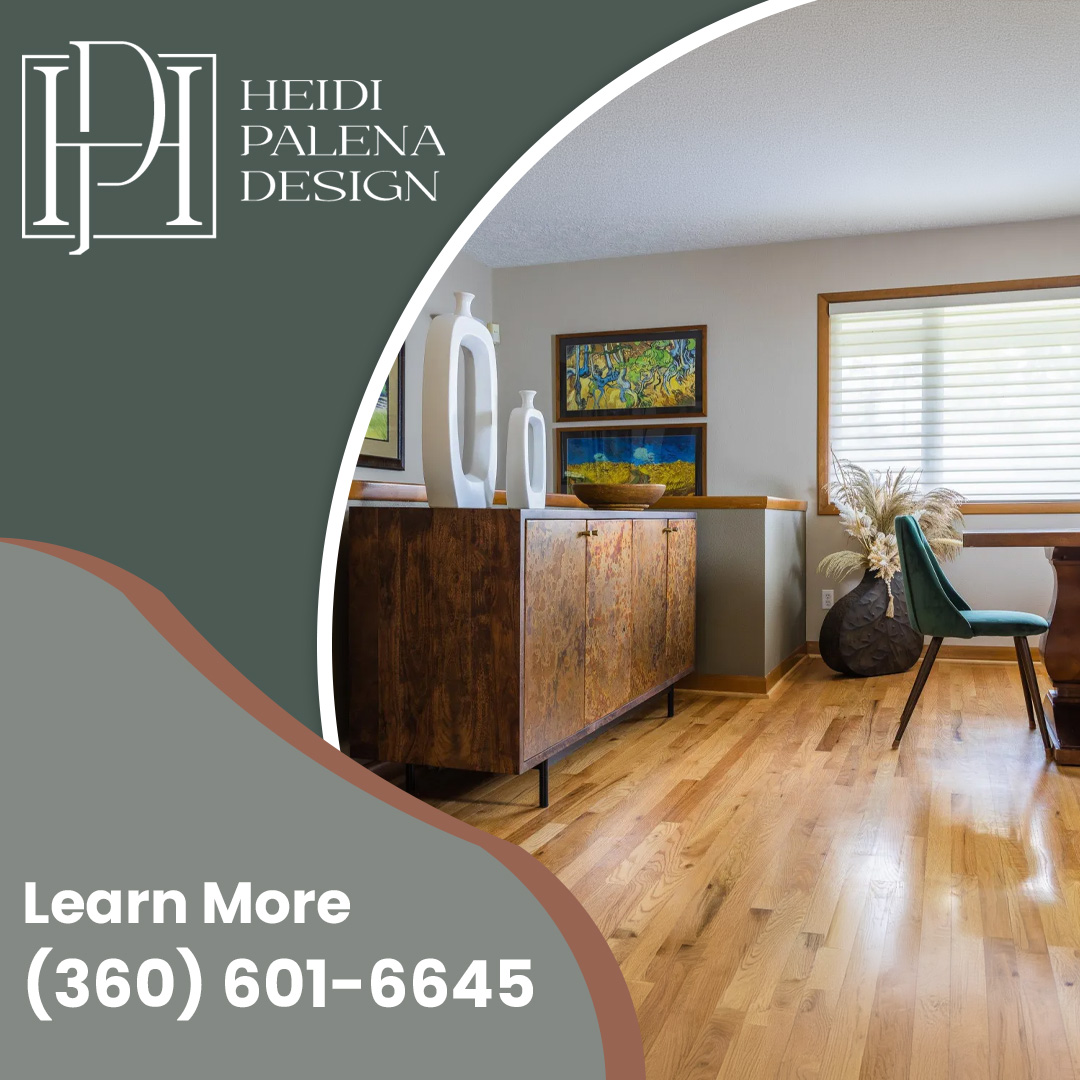 Elegantly styled dining area featuring hardwood floors, a wooden sideboard credenza with modern white vases, and an emerald green dining chair.