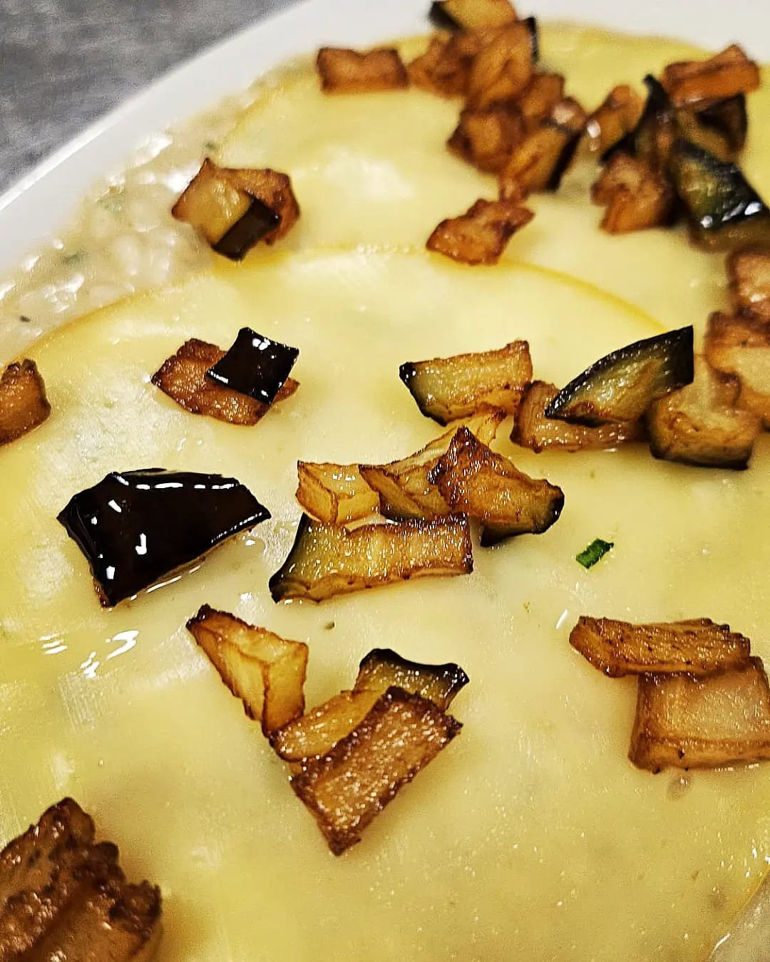Ravioli con melanzane fritte