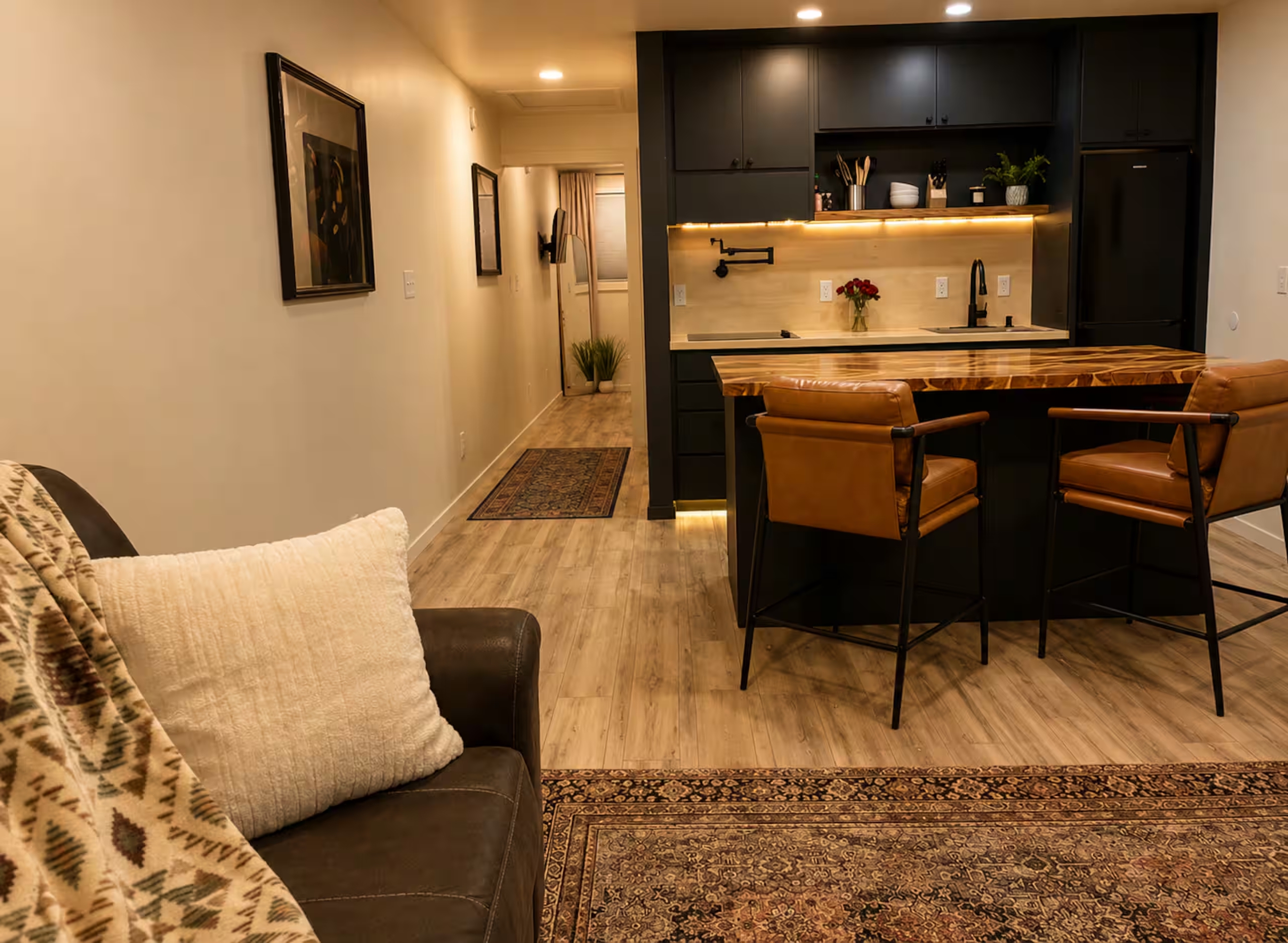 Concrete Rose STR living room with 60-inch smart TV — Montgomery Alabama