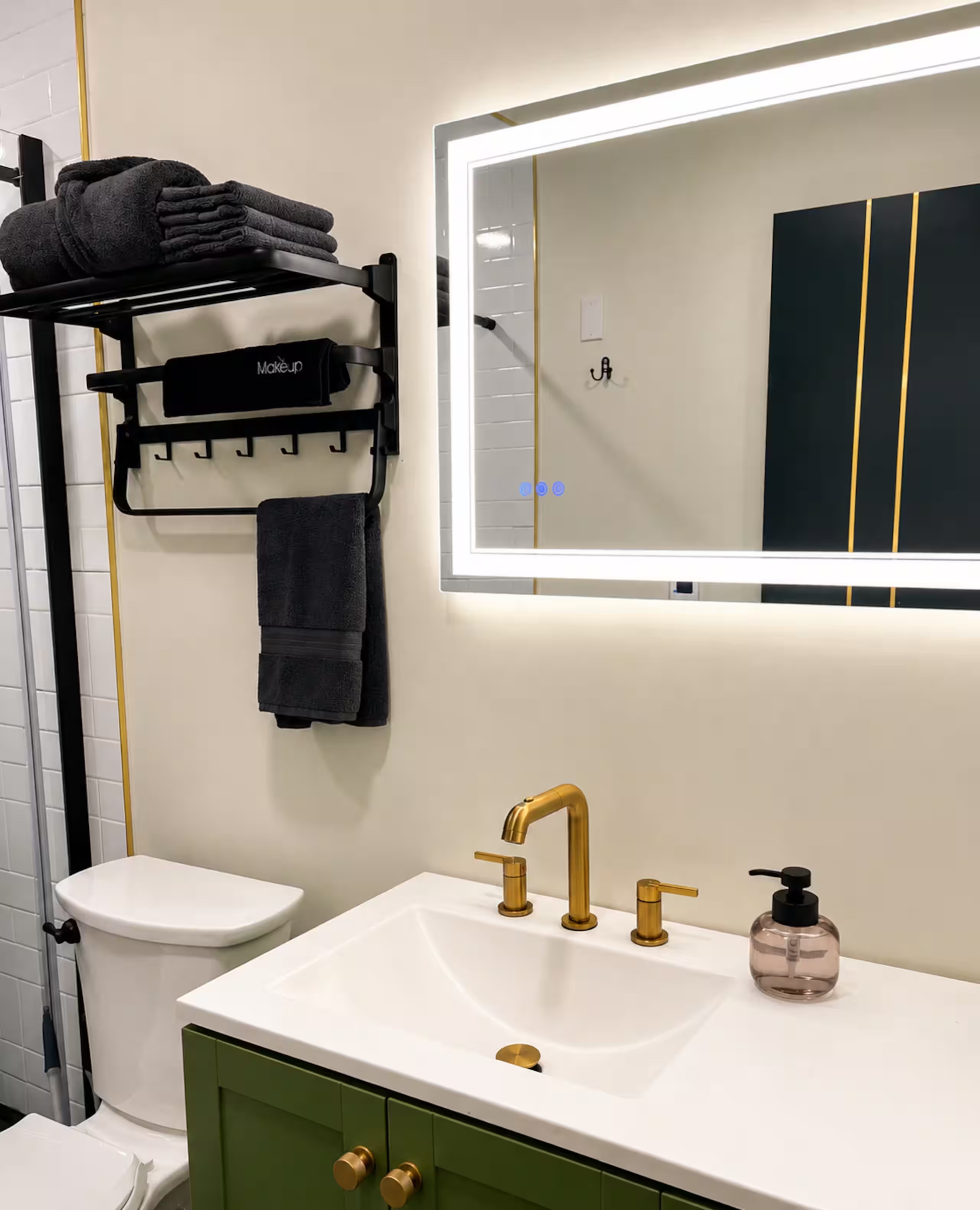 Modern bathroom vanity and anti-fog mirror at Concrete Rose